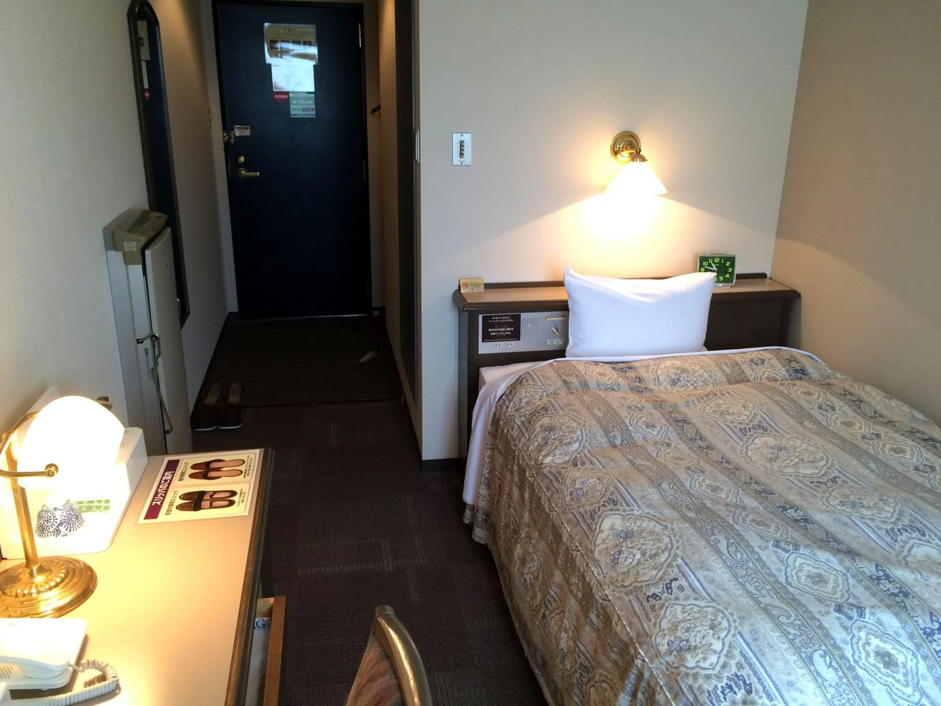 Photo of the whole room, Bed in Hotel Crown Hills Takaoka