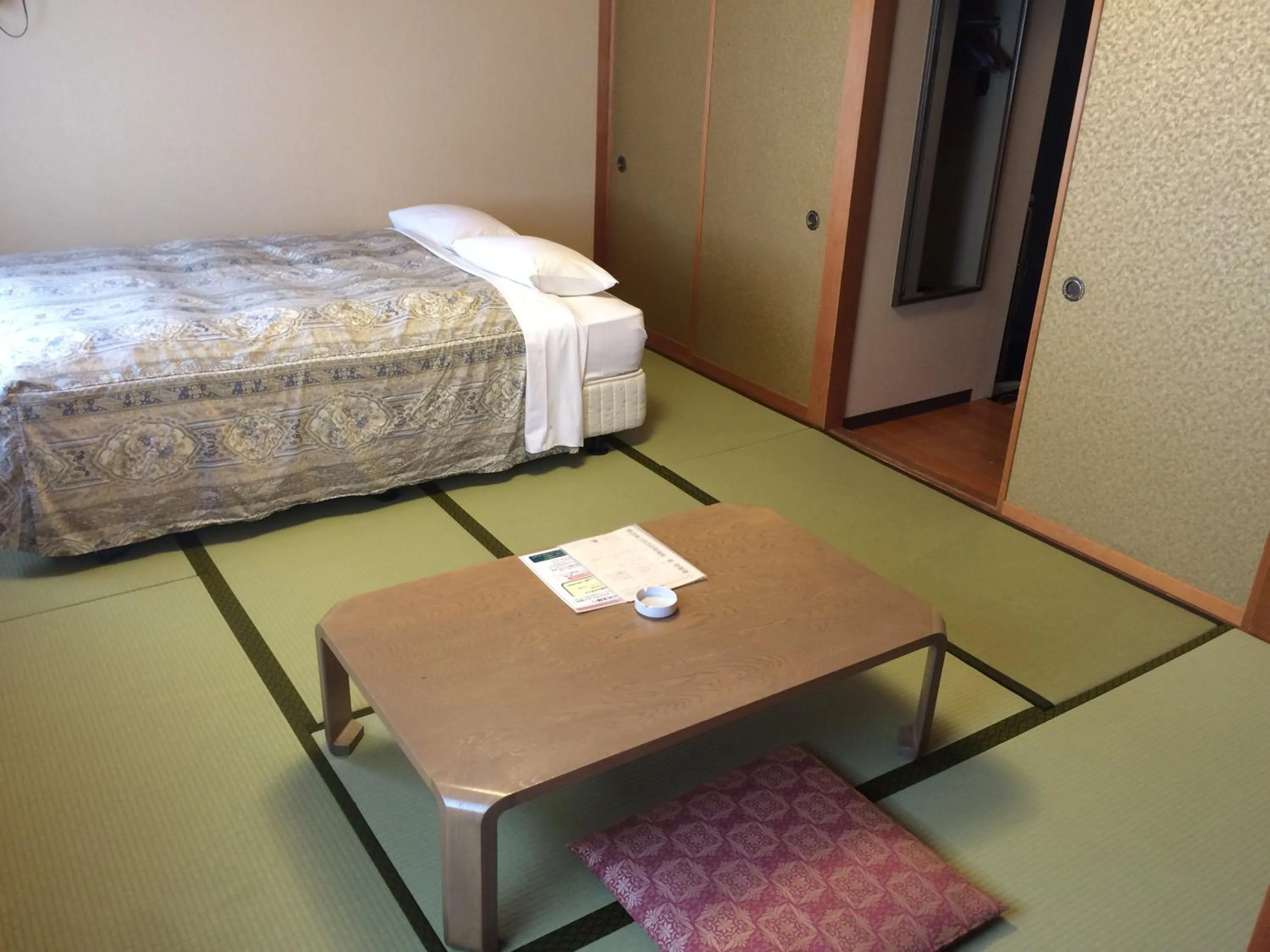 Photo of the whole room, Bed in Hotel Crown Hills Takaoka
