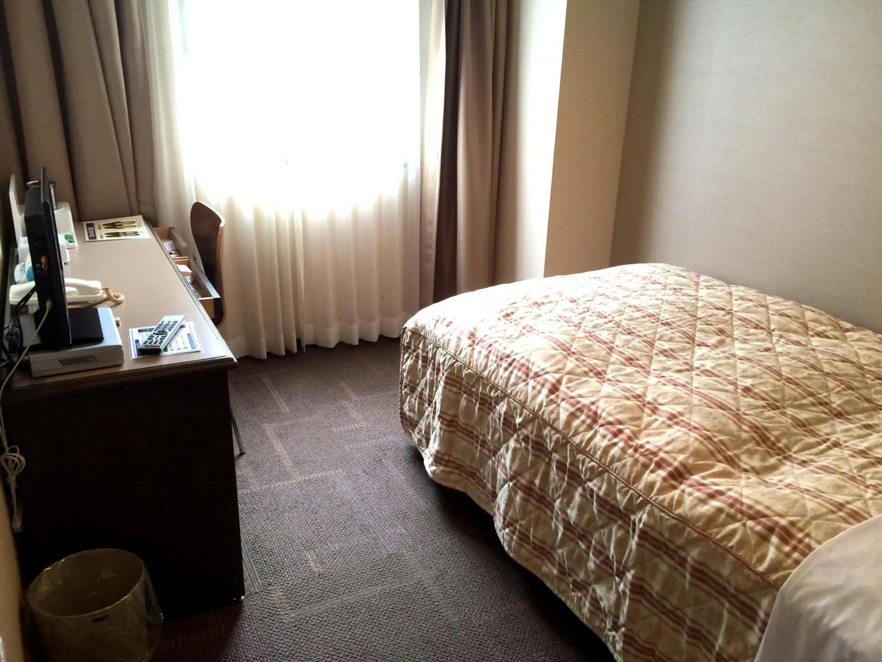 Photo of the whole room, Bed in Hotel Crown Hills Takaoka