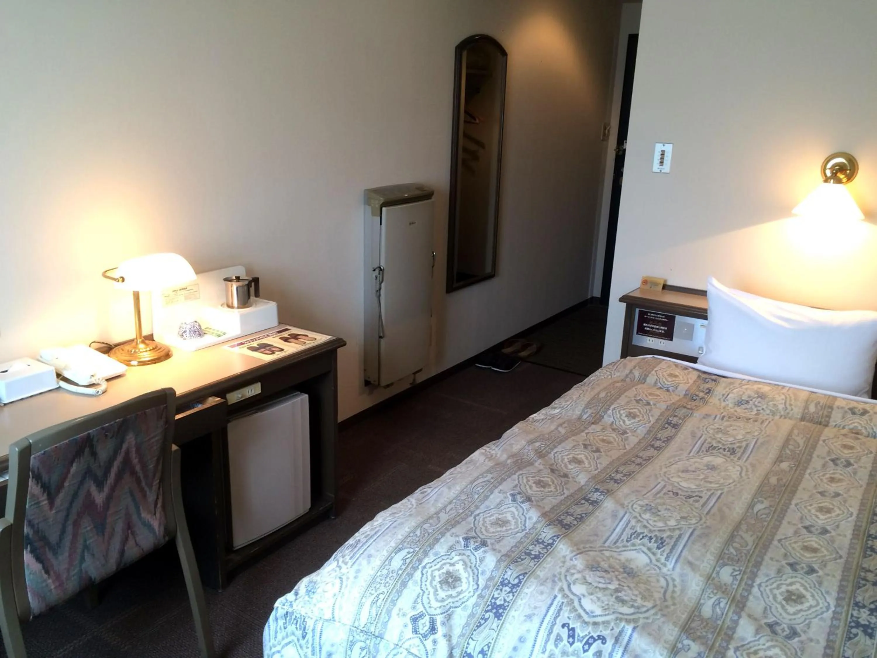 Photo of the whole room, Bed in Hotel Crown Hills Takaoka