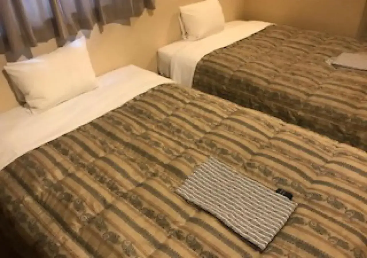 Bed in Business Hotel Goi Hills Bed in Business Hotel Goi Hills