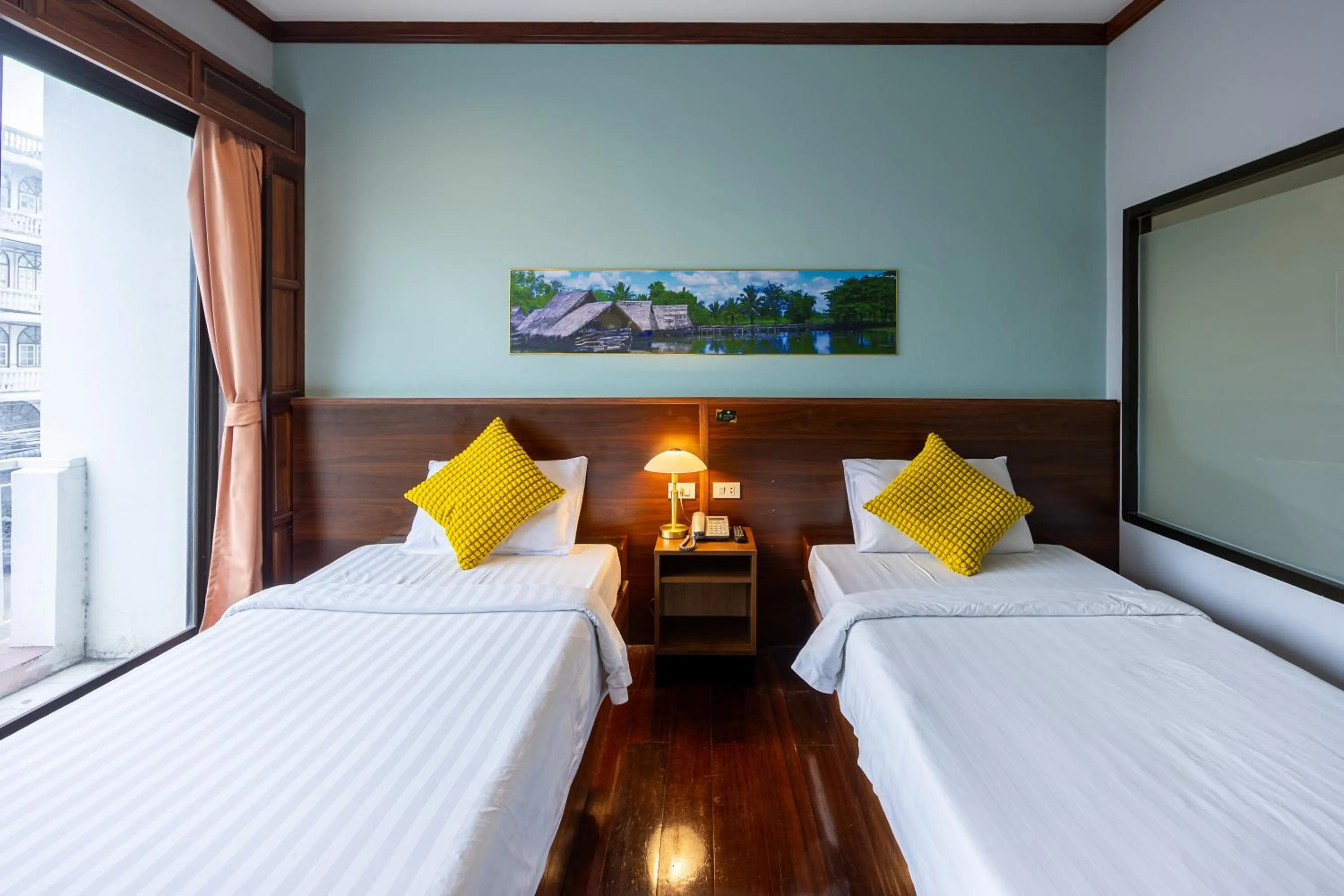 Bed in The President Hotel at Chokchai 4