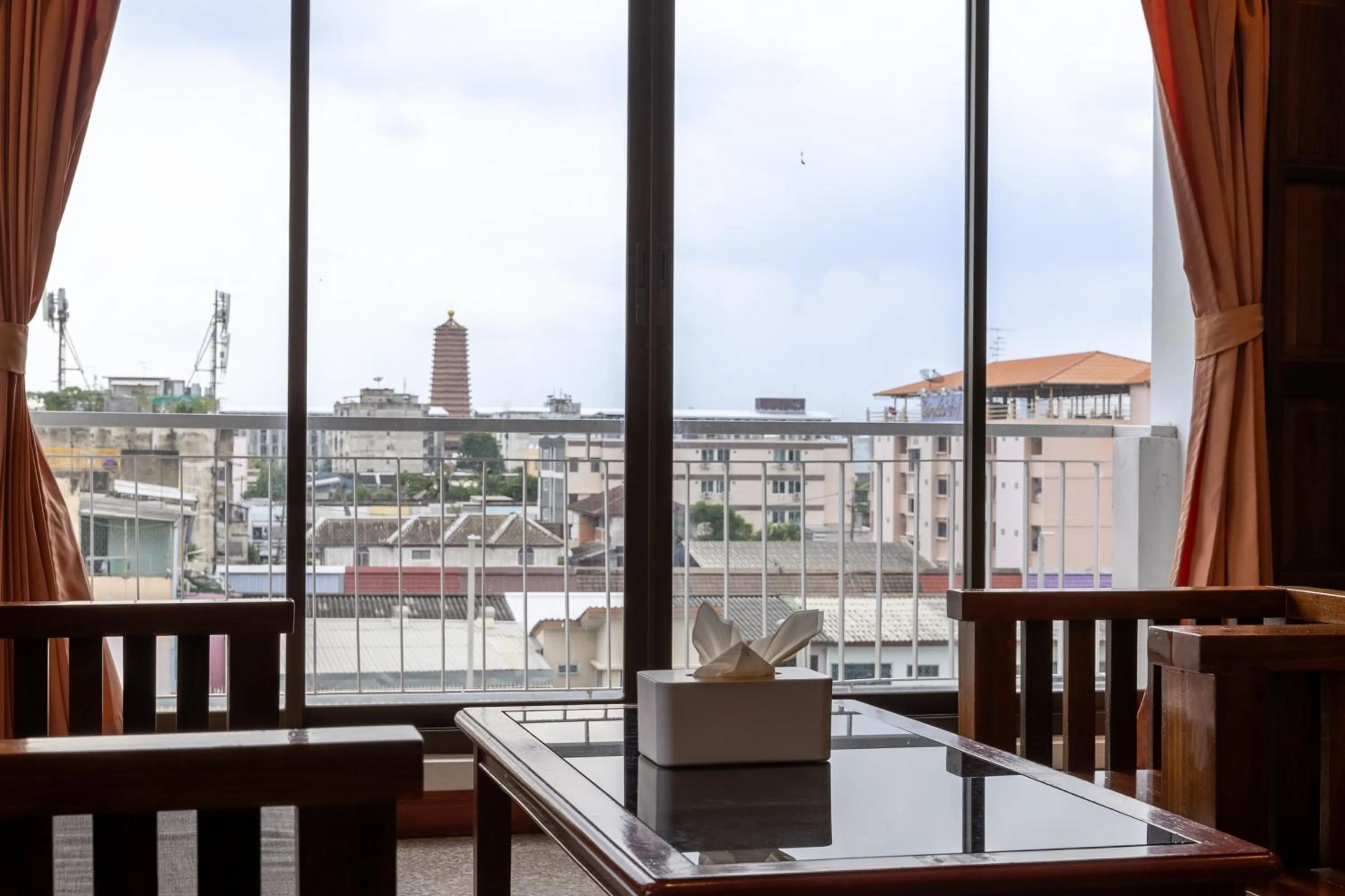 Seating area in The President Hotel at Chokchai 4