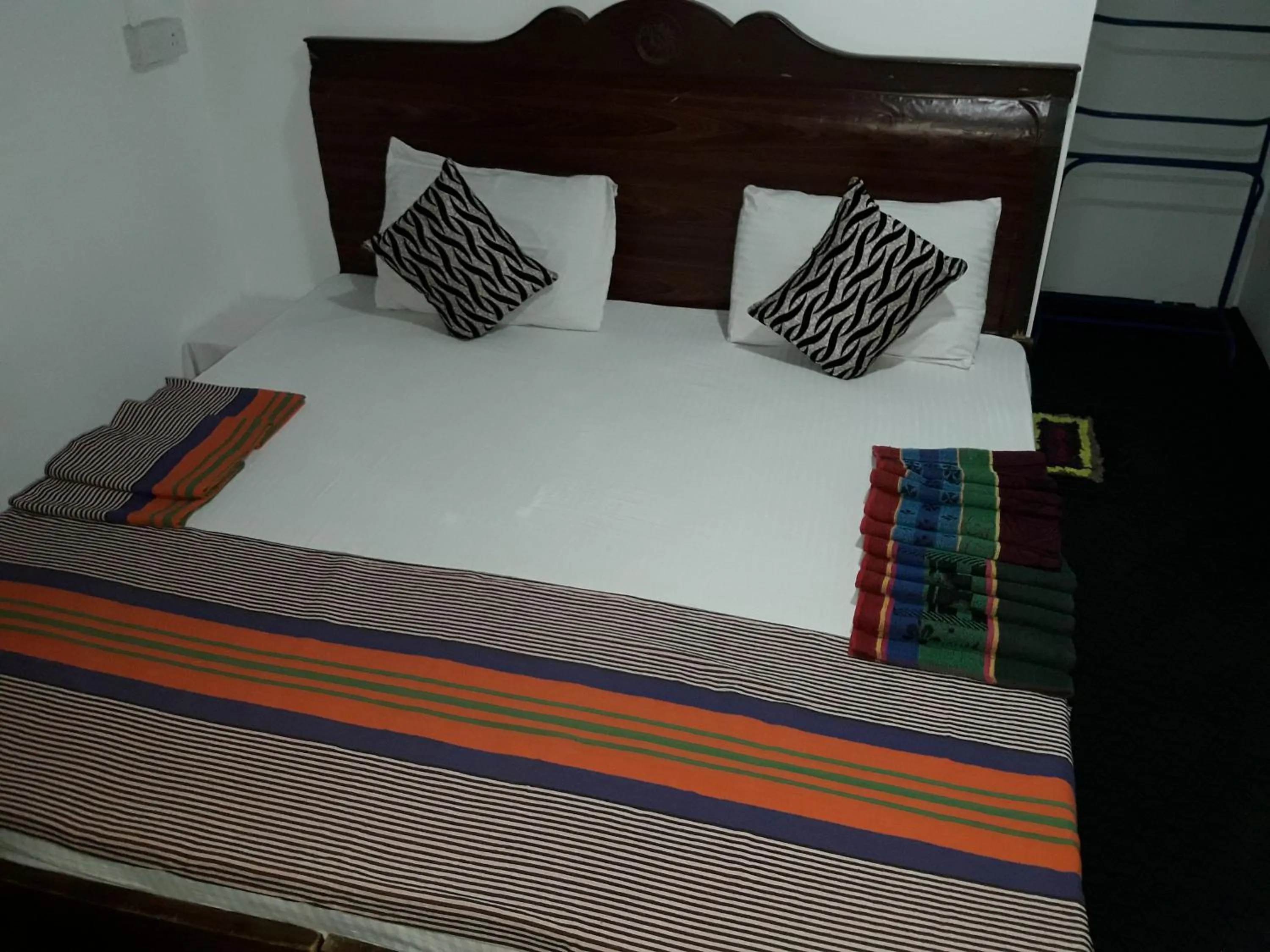 Bed in Nilaveli Beach Rooms