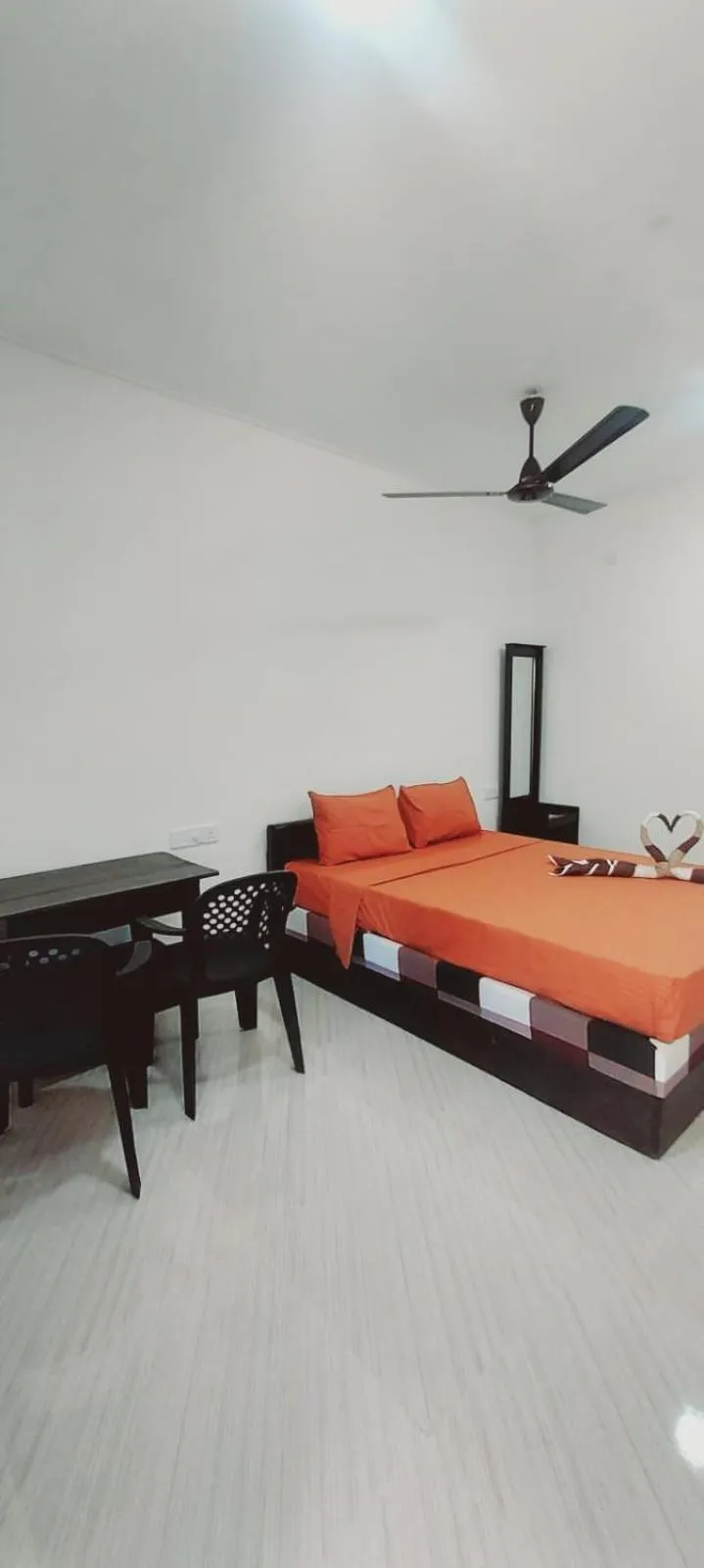 Bed in Nilaveli Beach Rooms