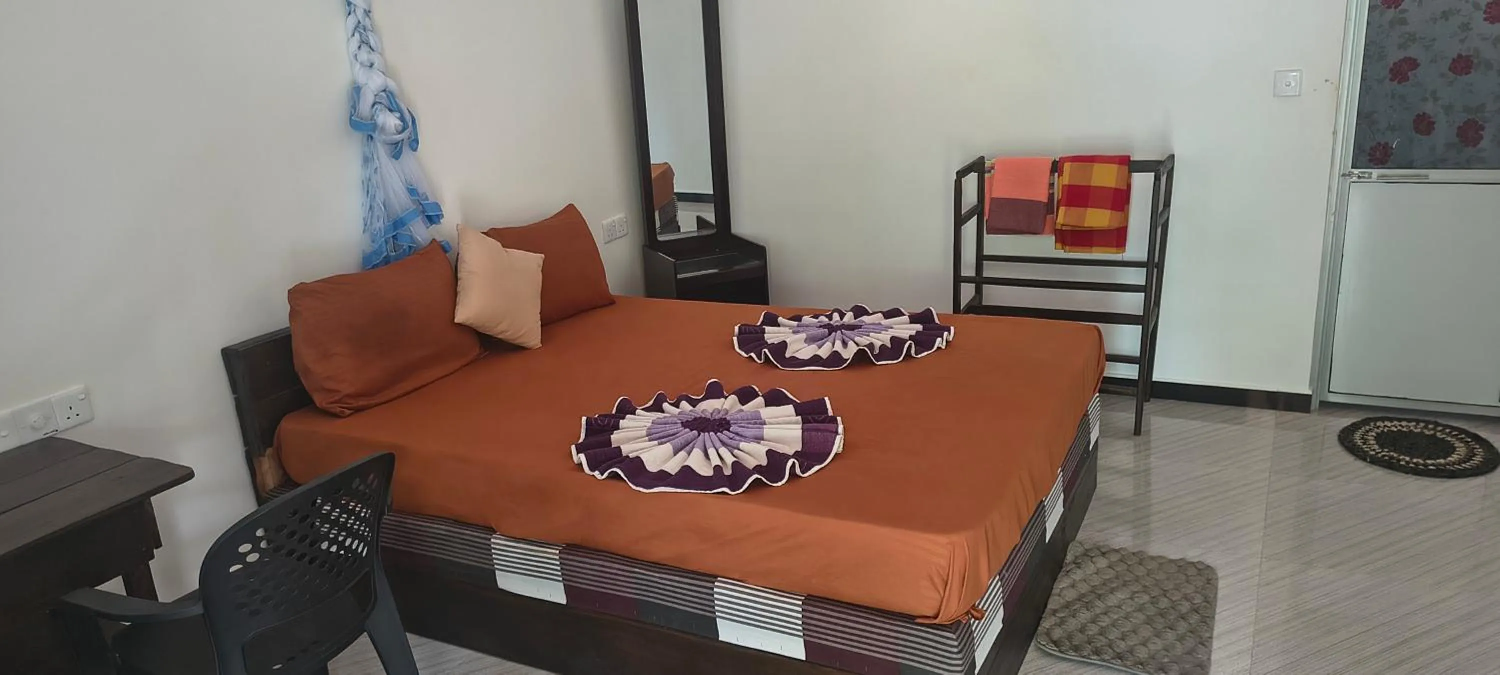 Bed in Nilaveli Beach Rooms