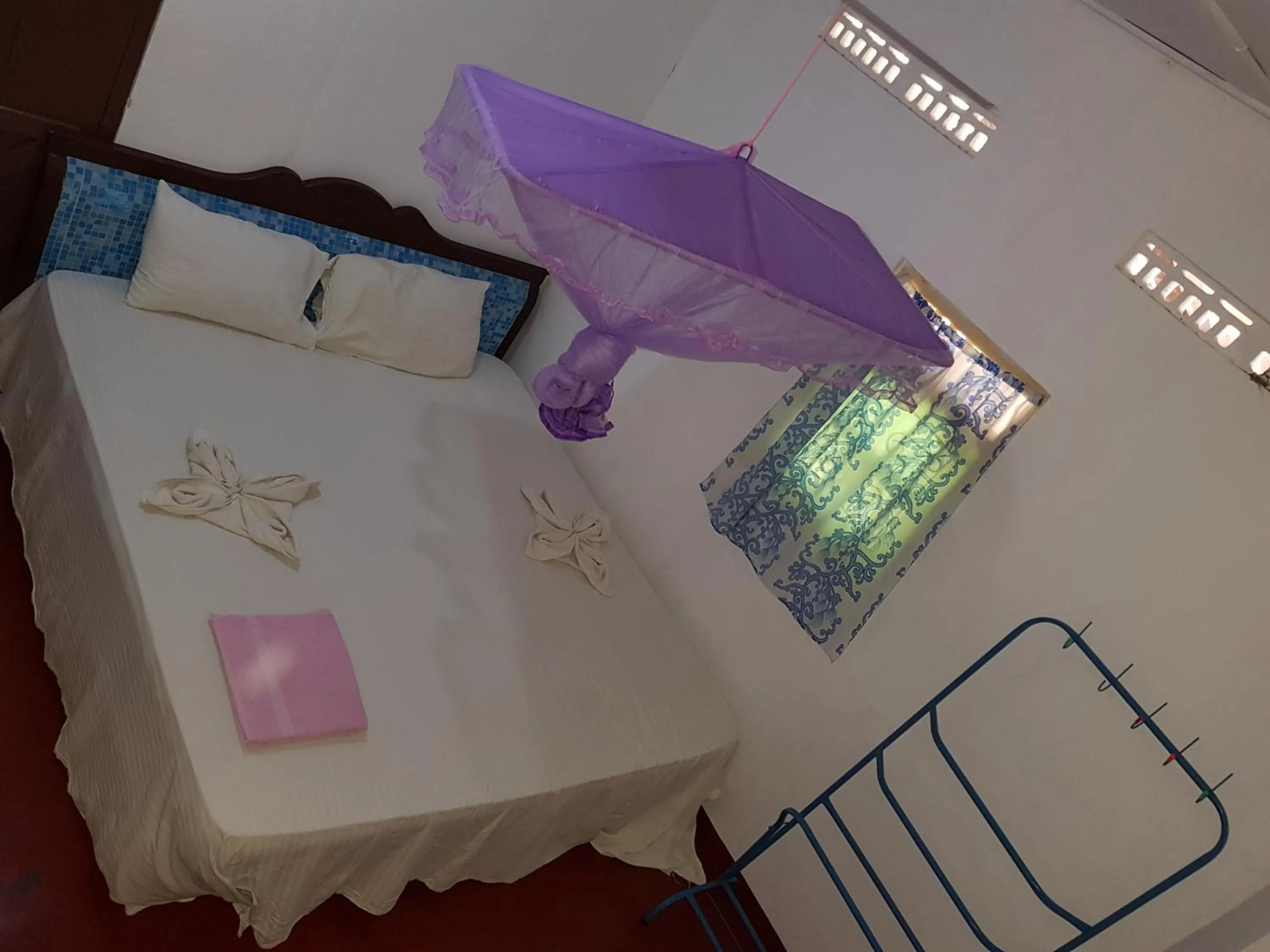 Bed in Nilaveli Beach Rooms