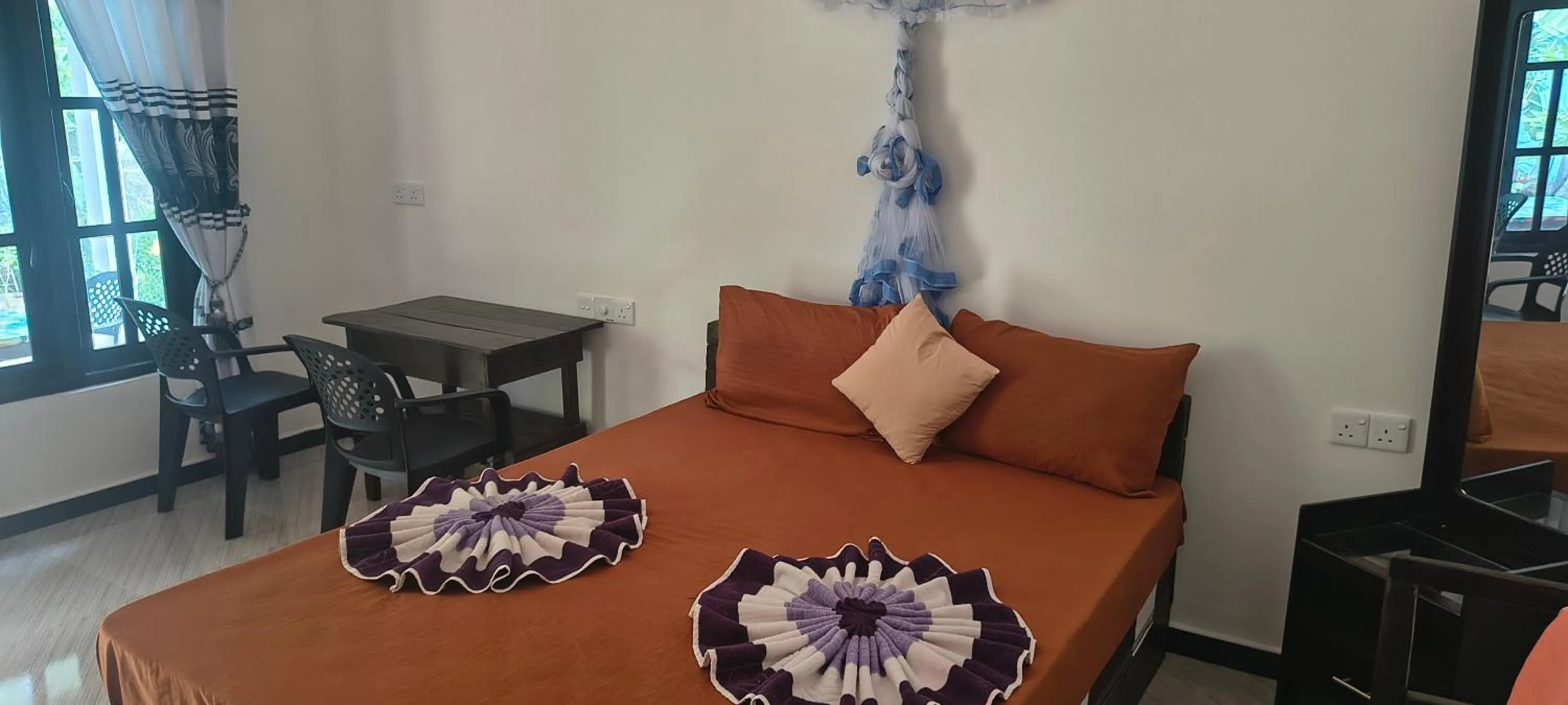 Bed in Nilaveli Beach Rooms