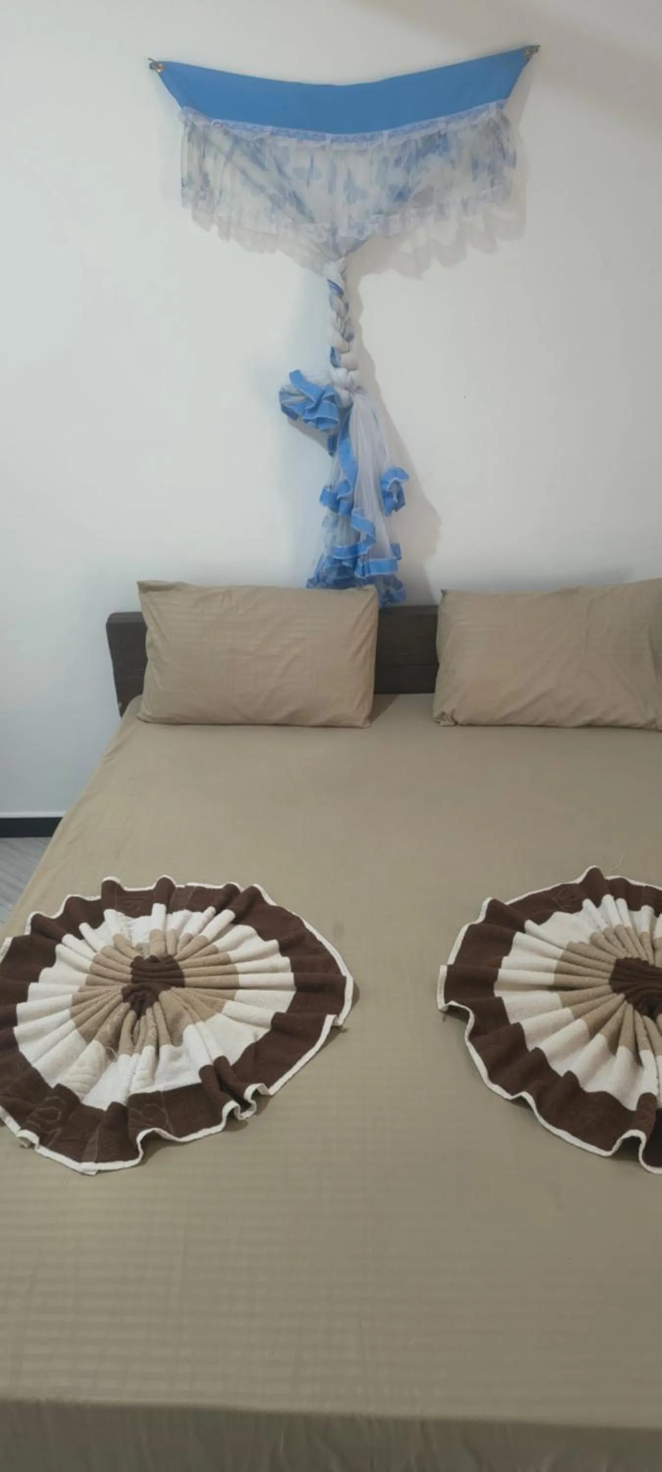 Bed in Nilaveli Beach Rooms