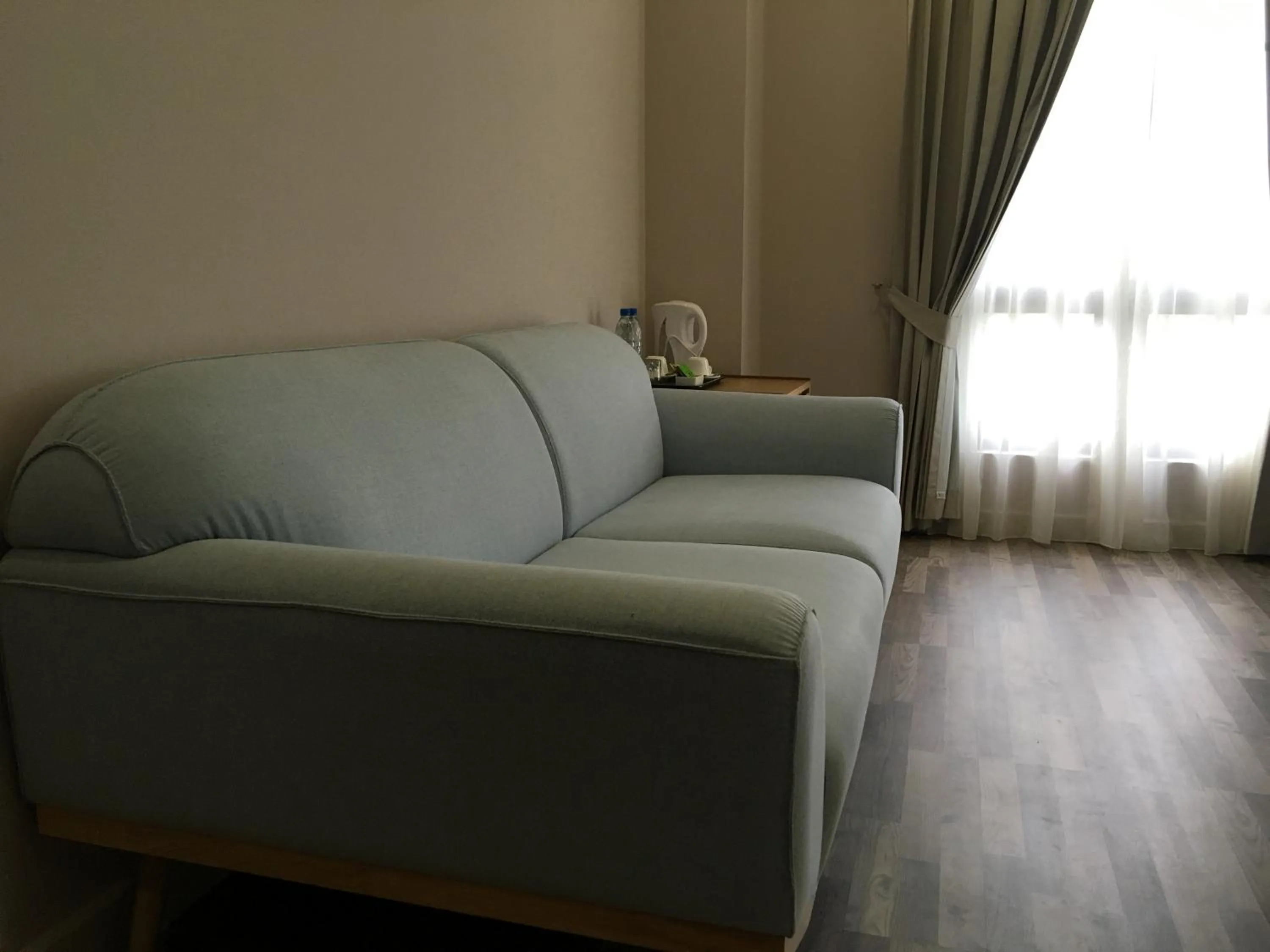 Seating area in D'Anggerek Serviced Apartment