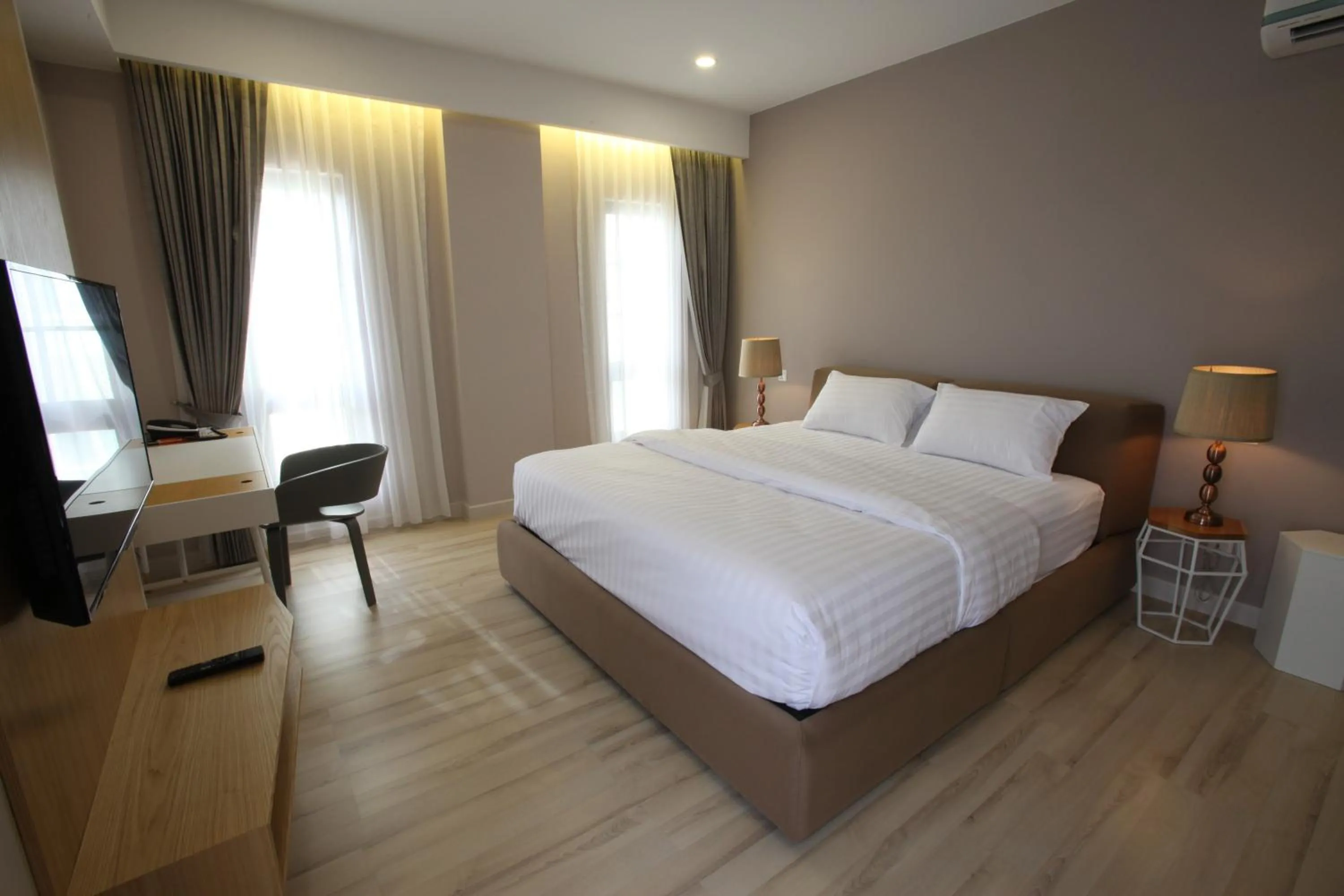 TV and multimedia, Bed in D'Anggerek Serviced Apartment
