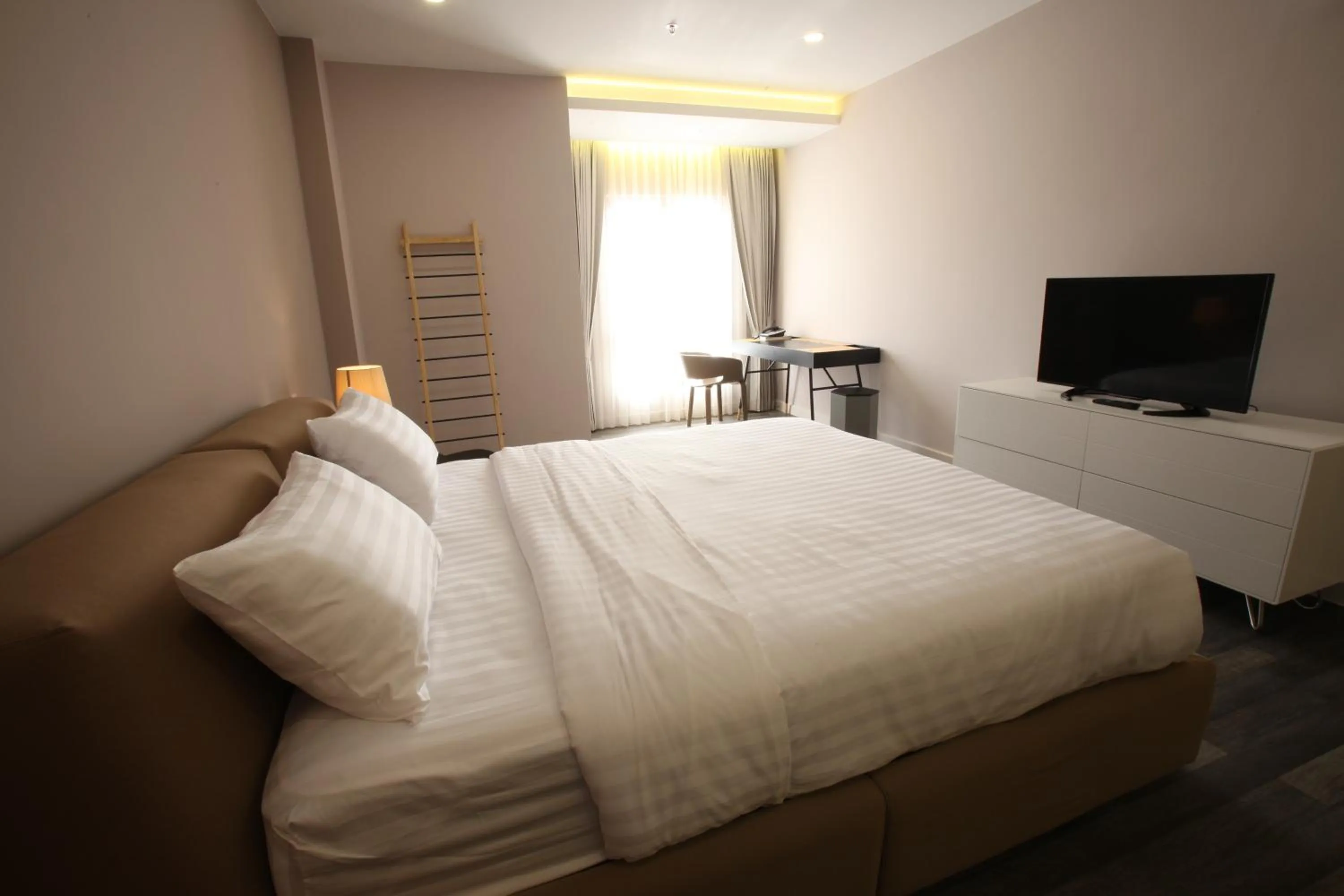 Bed in D'Anggerek Serviced Apartment