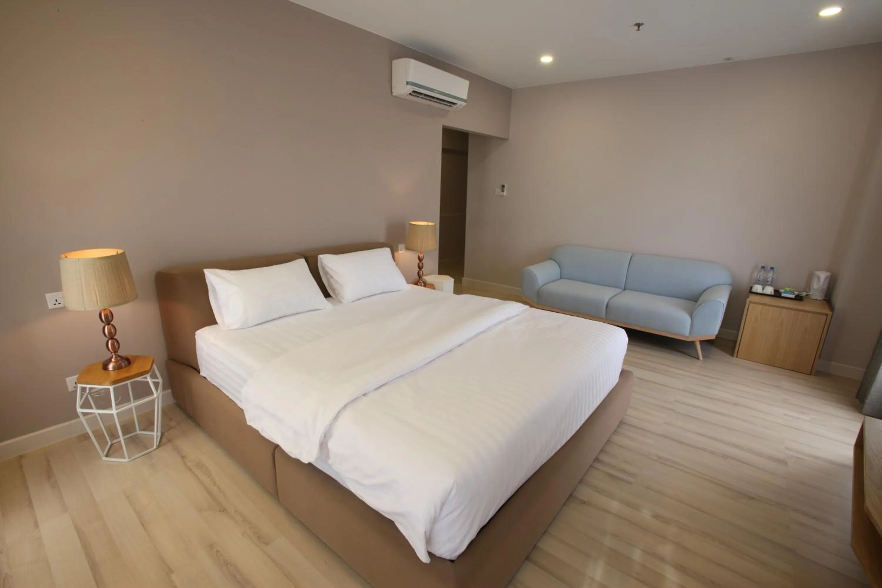 Living room, Bed in D'Anggerek Serviced Apartment