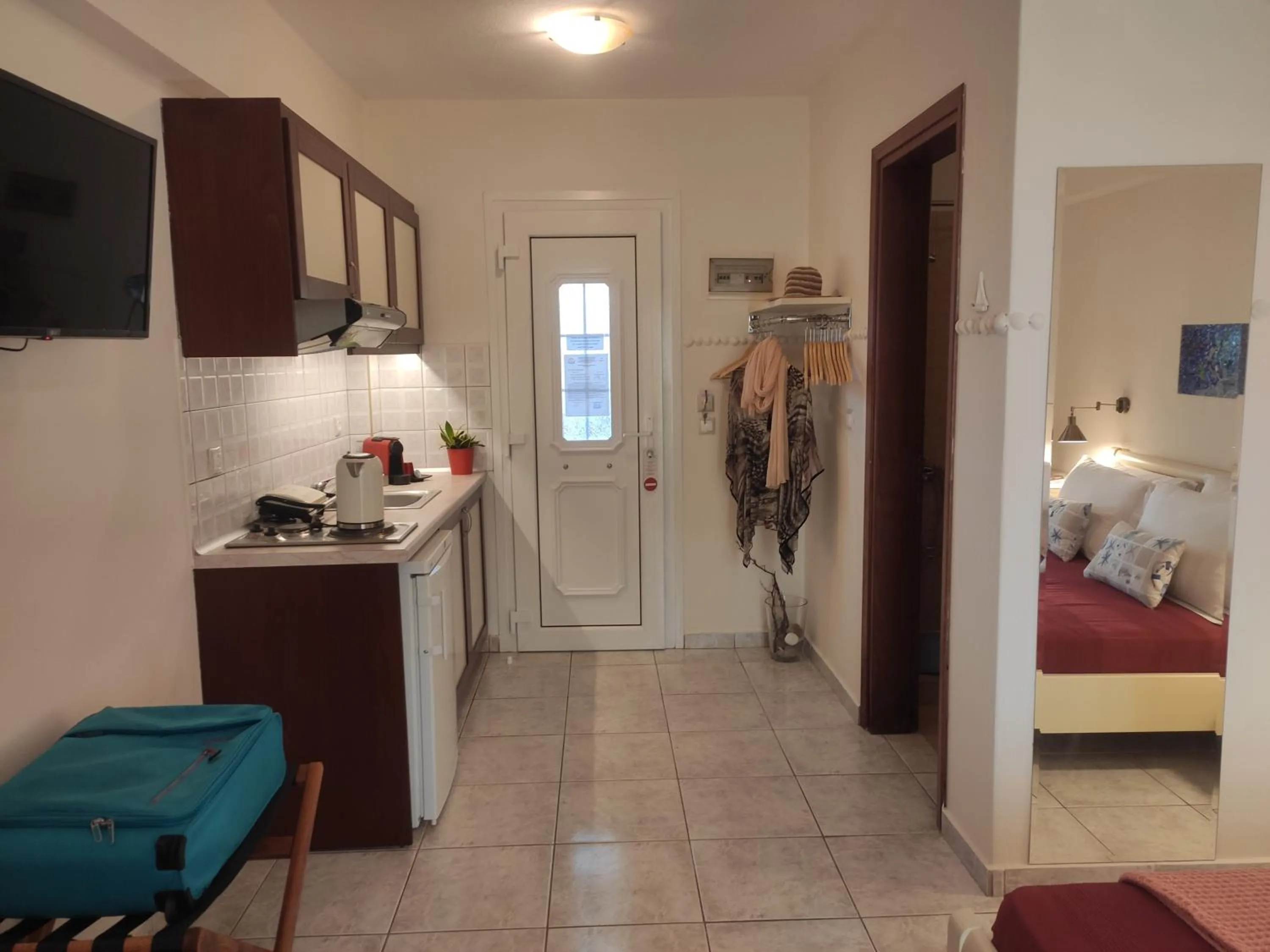 Kitchen or kitchenette, Bed in Aristea Studios