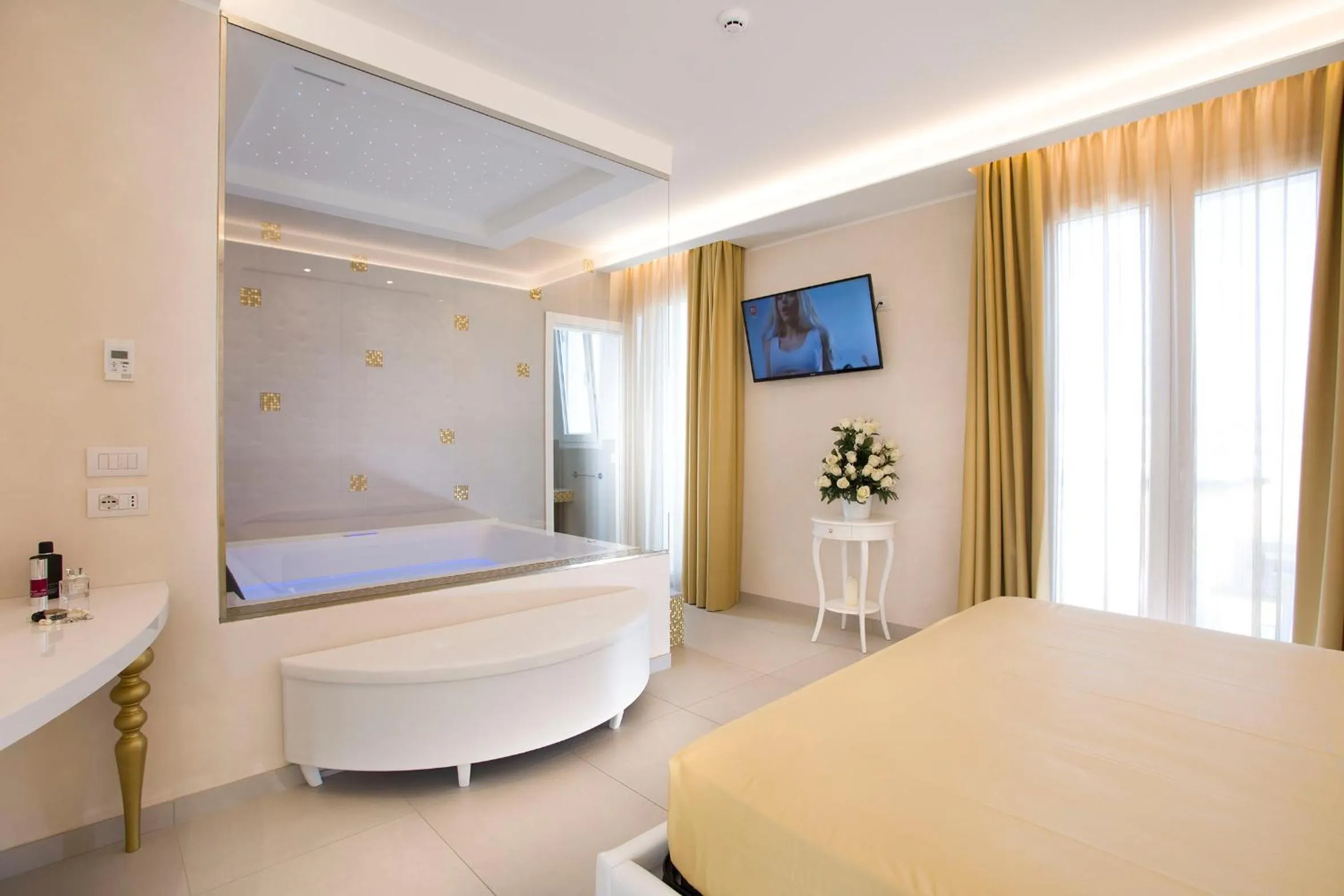 Bed in White Suite & Apartments