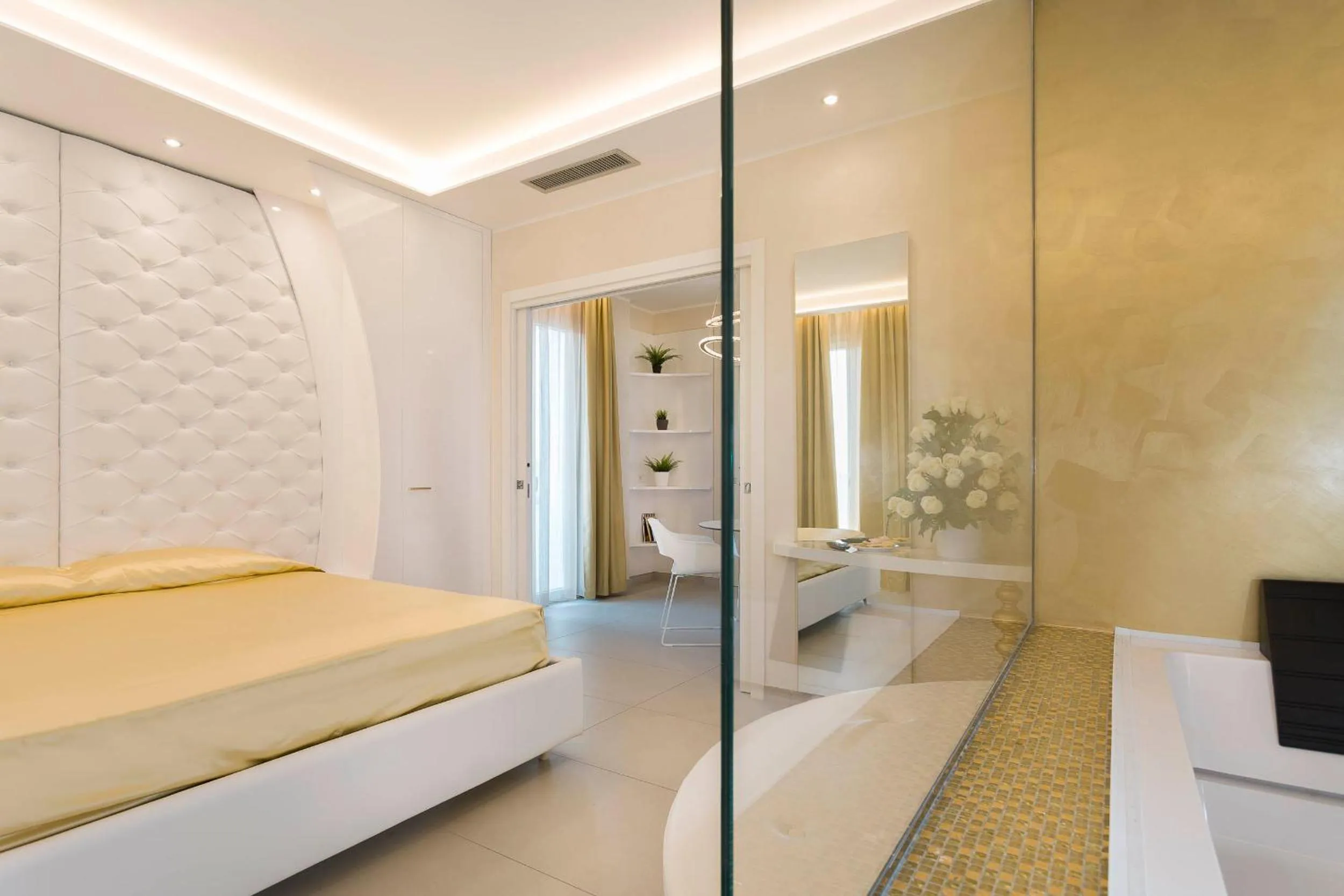 Bed in White Suite & Apartments