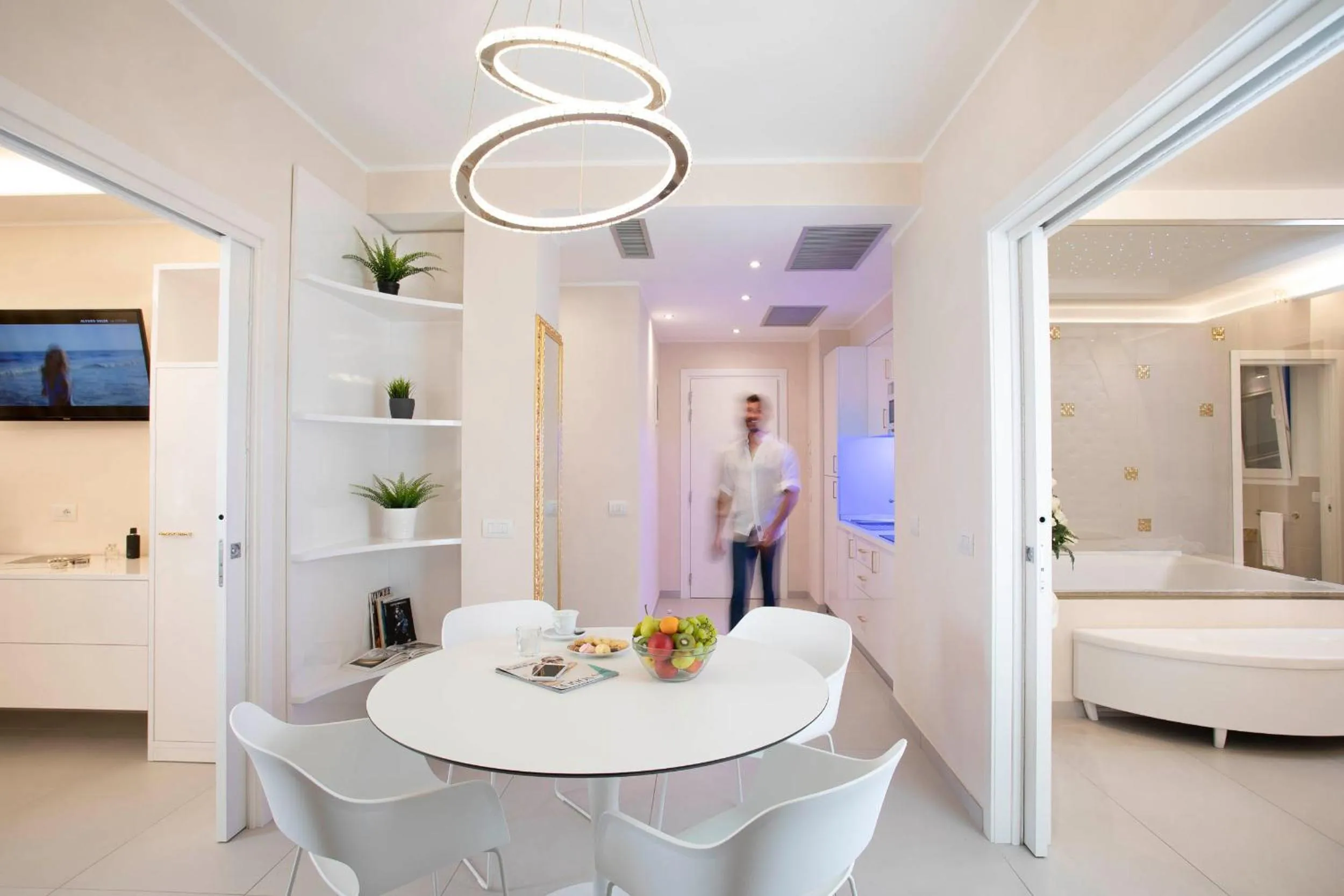 Bed in White Suite & Apartments