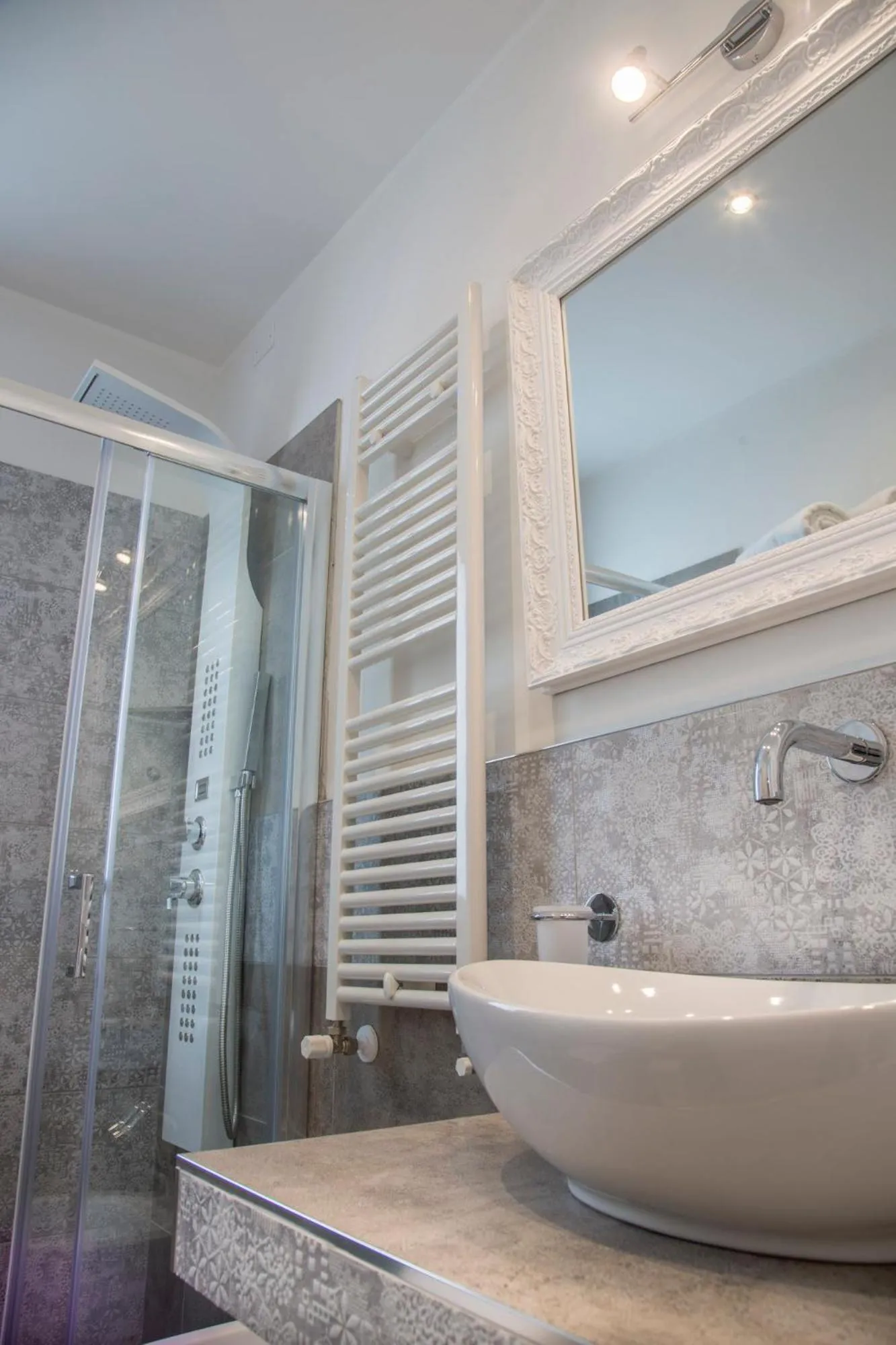 Shower in White Suite & Apartments