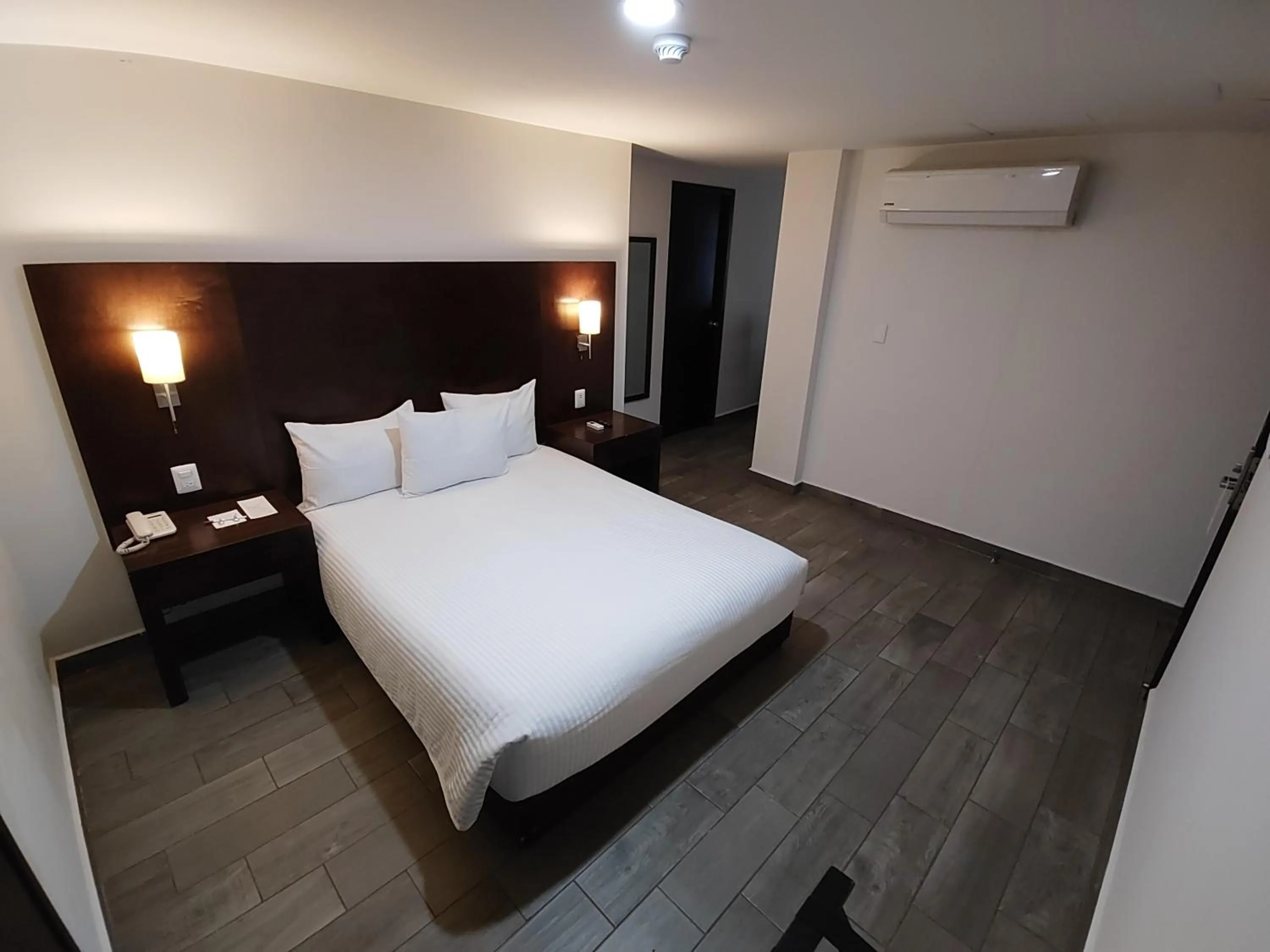 Photo of the whole room, Bed in Ramada by Wyndham Tampico Centro
