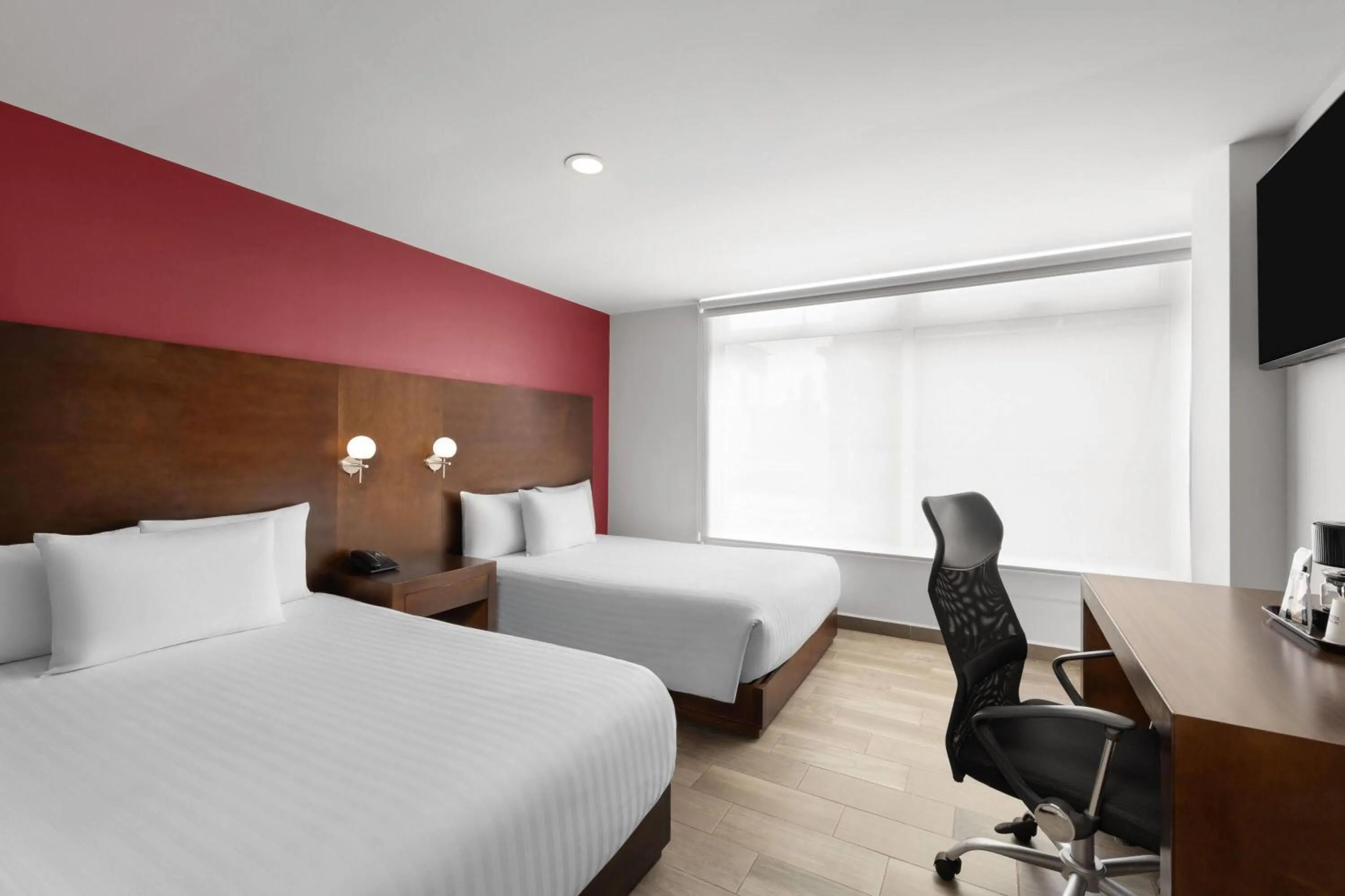 Photo of the whole room, Bed in Ramada by Wyndham Tampico Centro