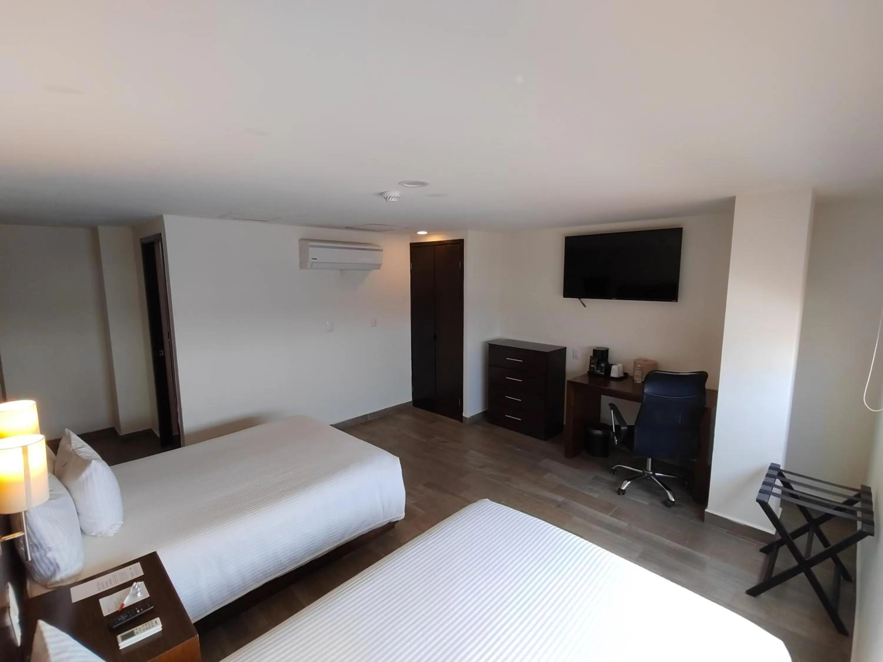 Photo of the whole room, Bed in Ramada by Wyndham Tampico Centro