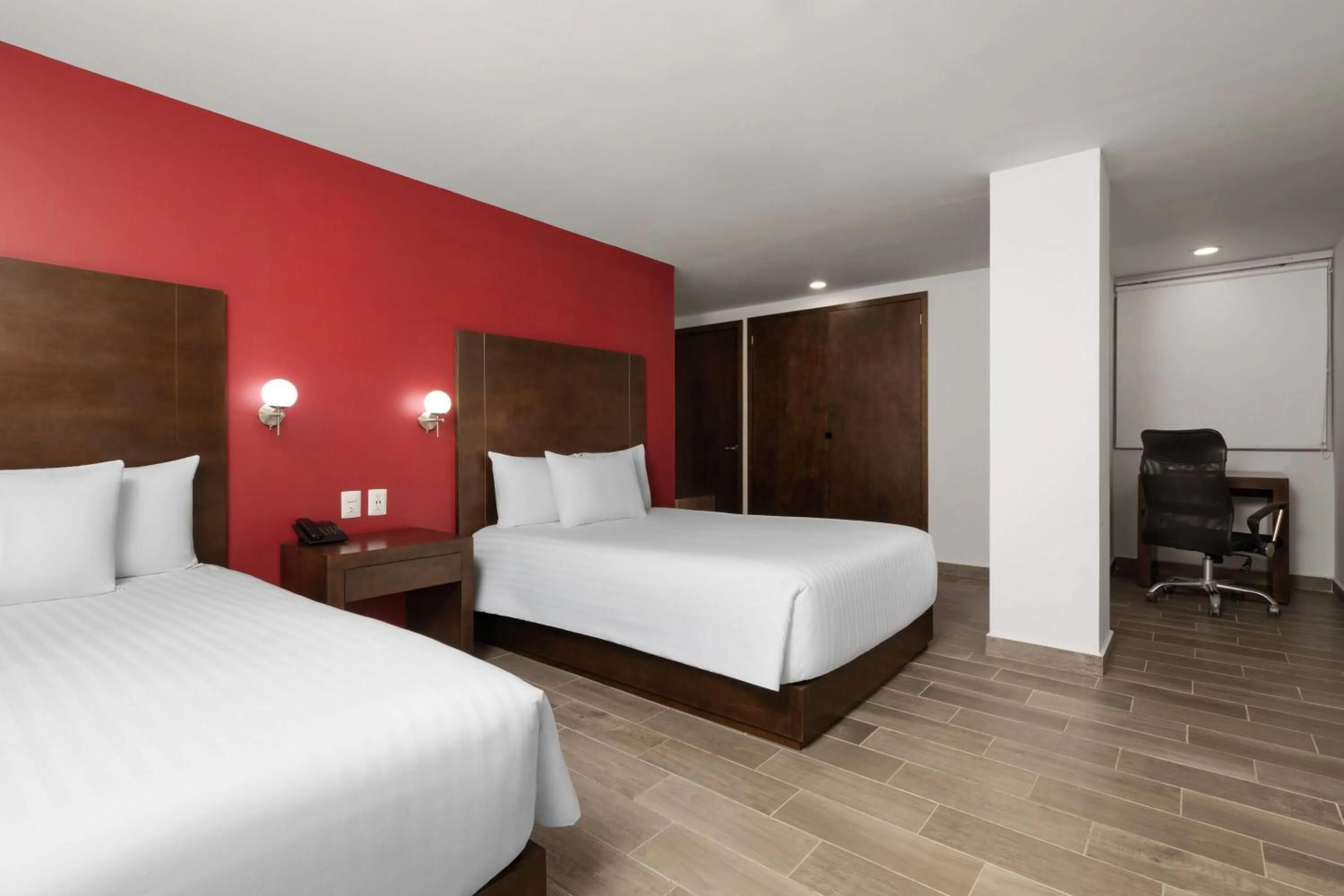Photo of the whole room, Bed in Ramada by Wyndham Tampico Centro