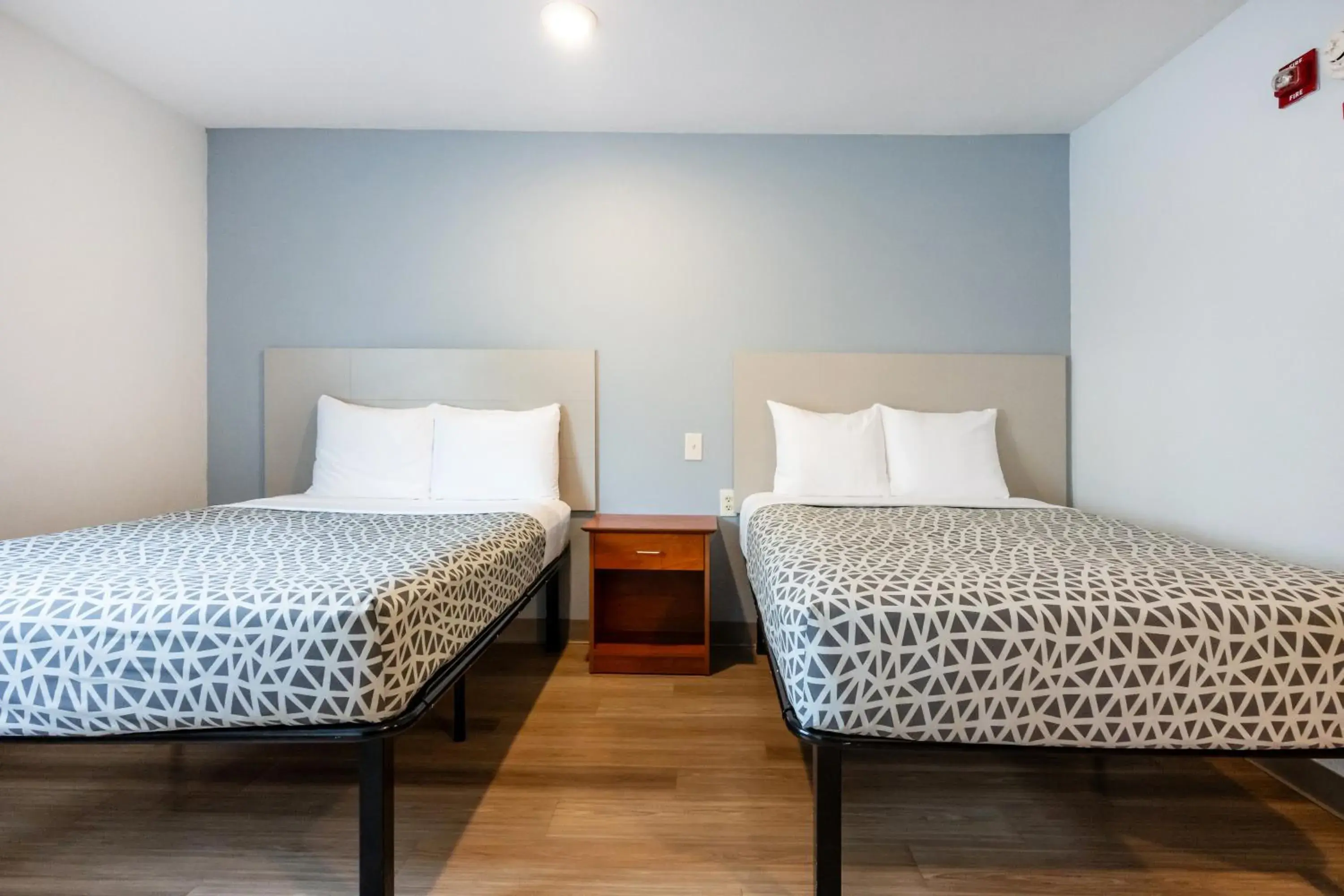 Bedroom, Bed in Suburban Studios Huntsville University Area Bedroom, Bed in Suburban Studios Huntsville University Area