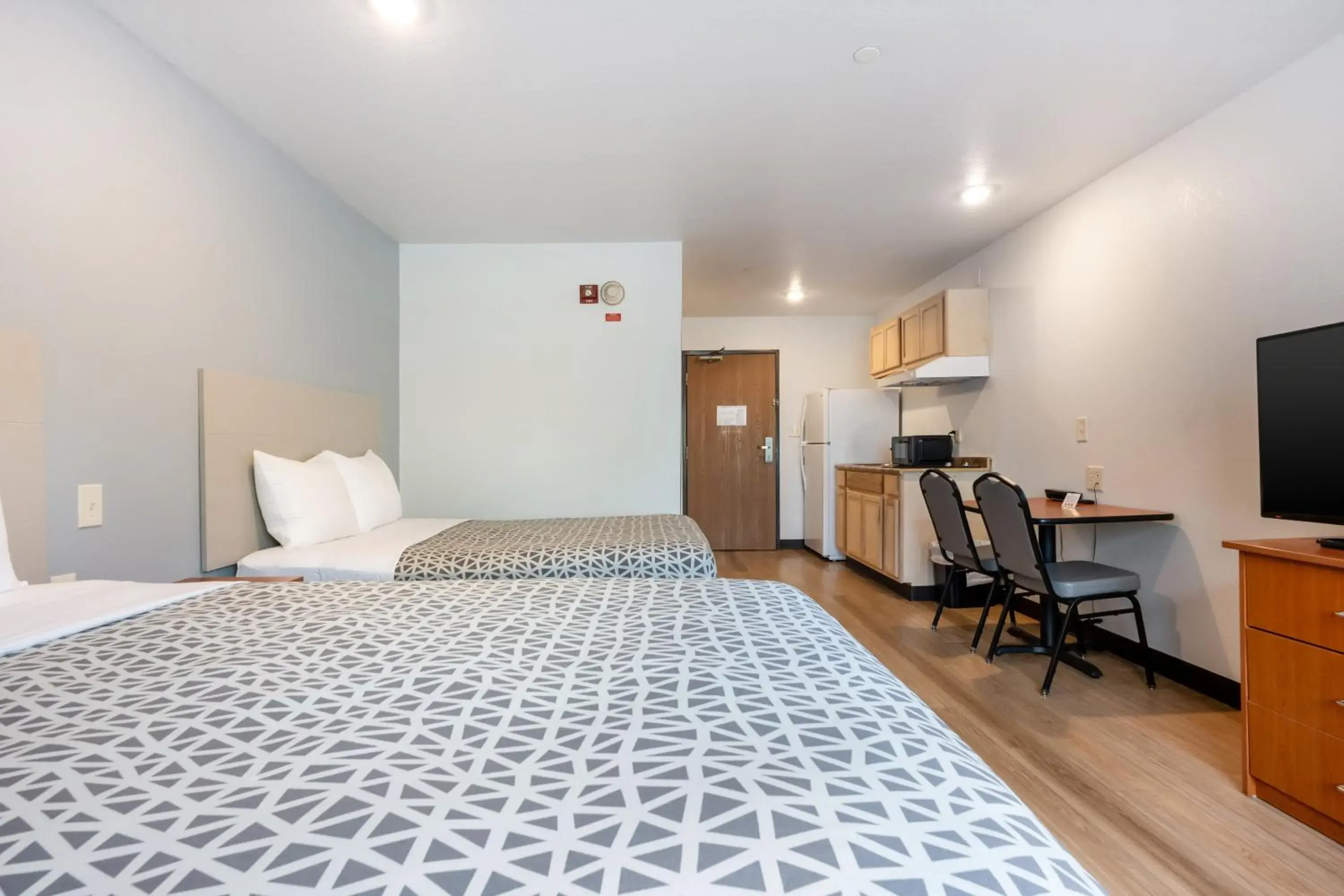 Bedroom, Bed in Suburban Studios Huntsville University Area Bedroom, Bed in Suburban Studios Huntsville University Area