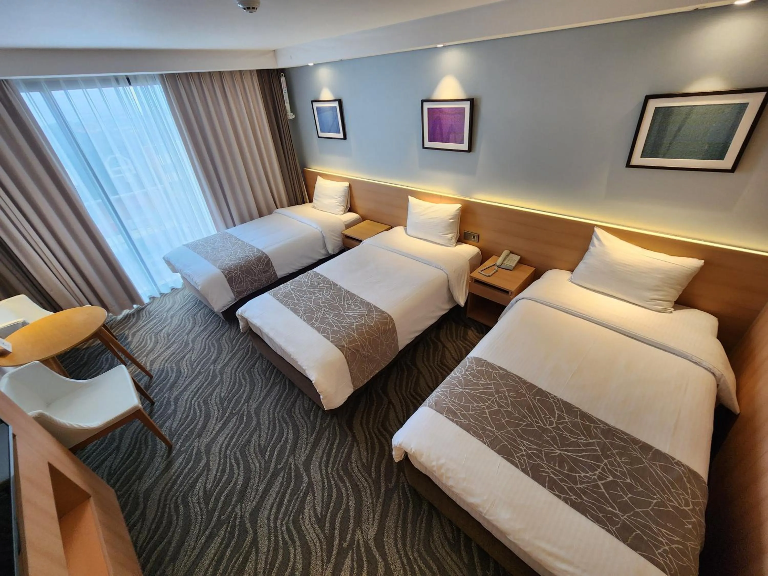 Bedroom, Bed in Seogwipo JS Hotel