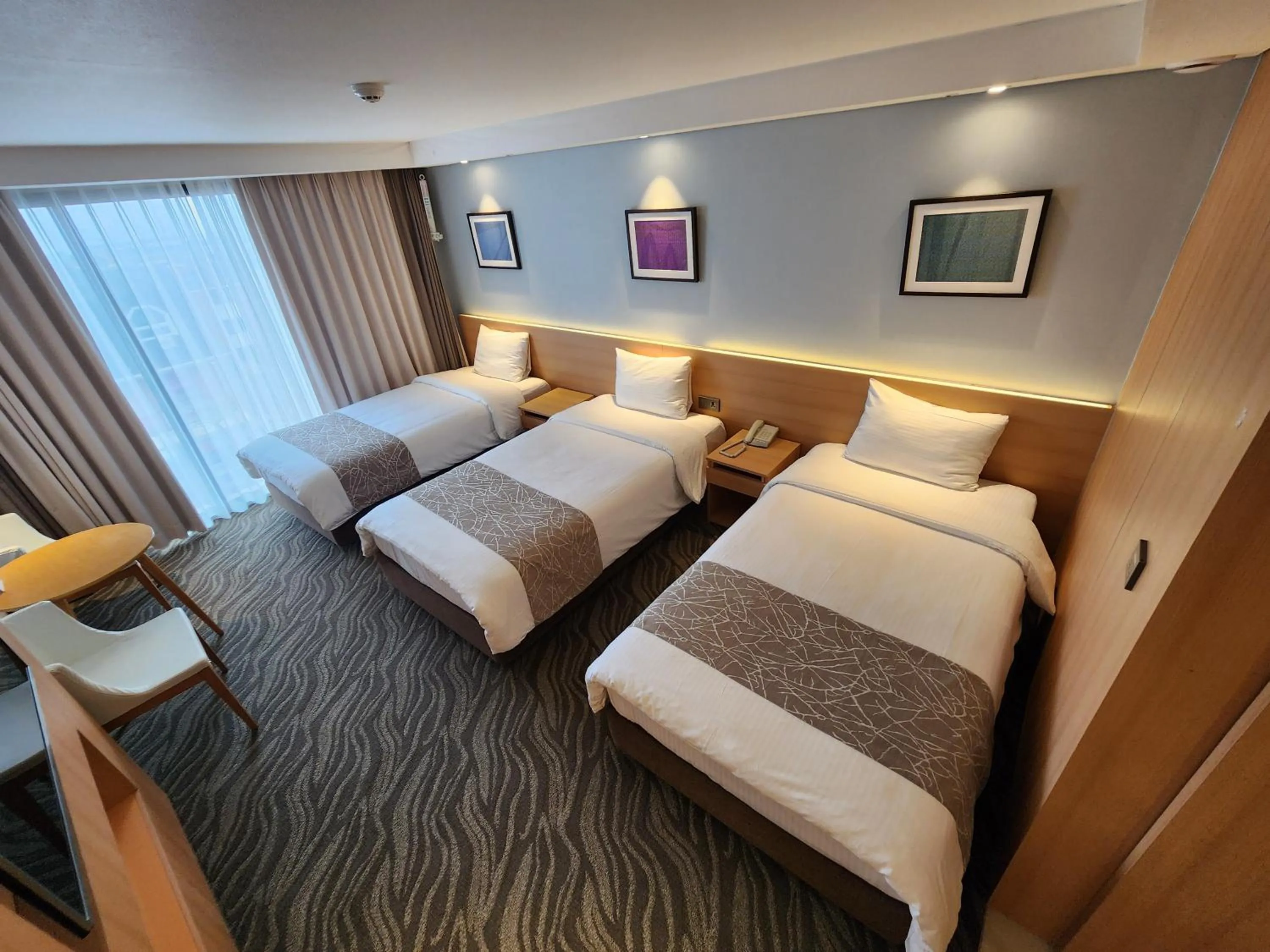 Bedroom, Bed in Seogwipo JS Hotel