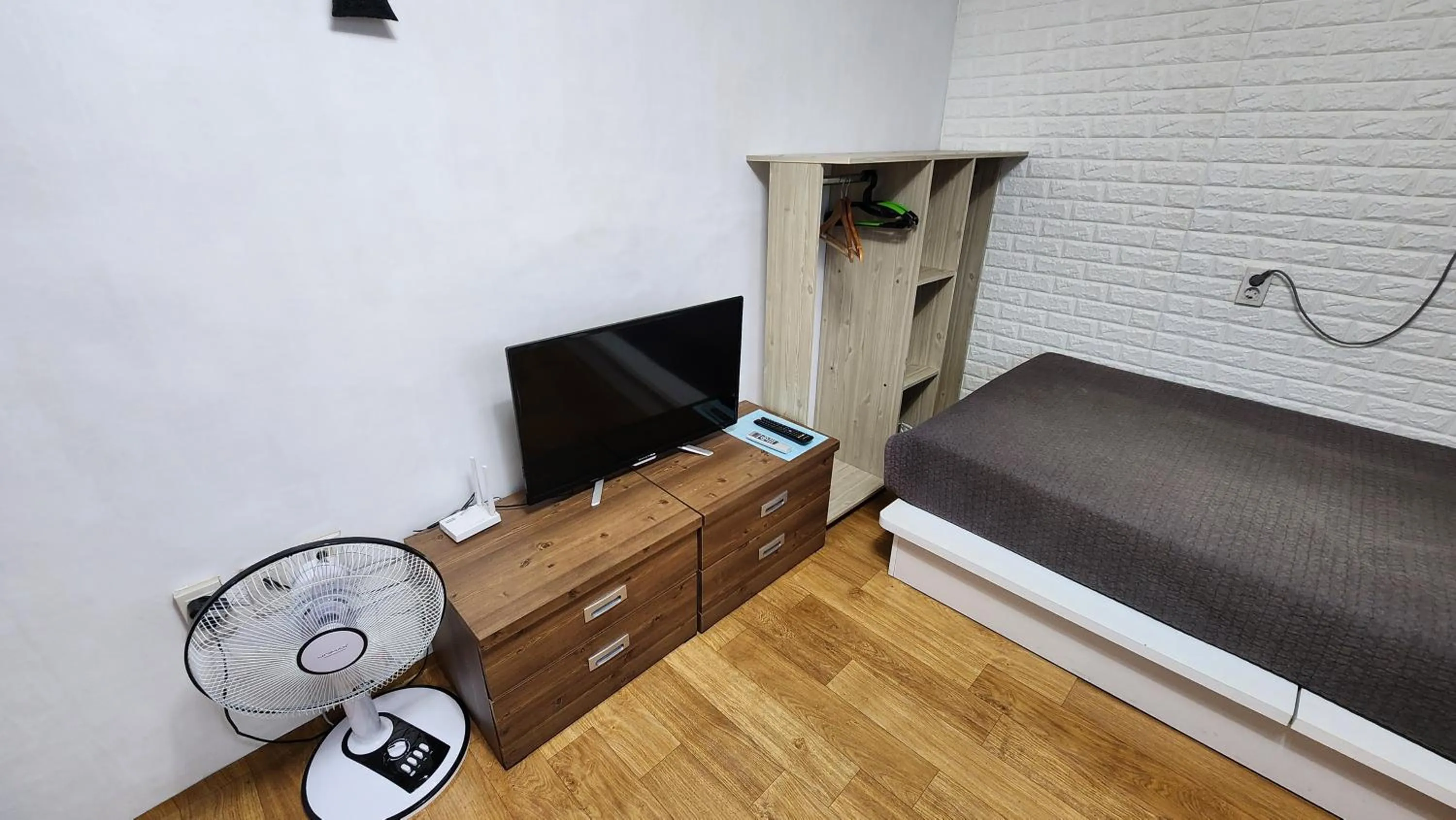 Communal lounge/ TV room in Daejeon Guesthouse Sky Garden