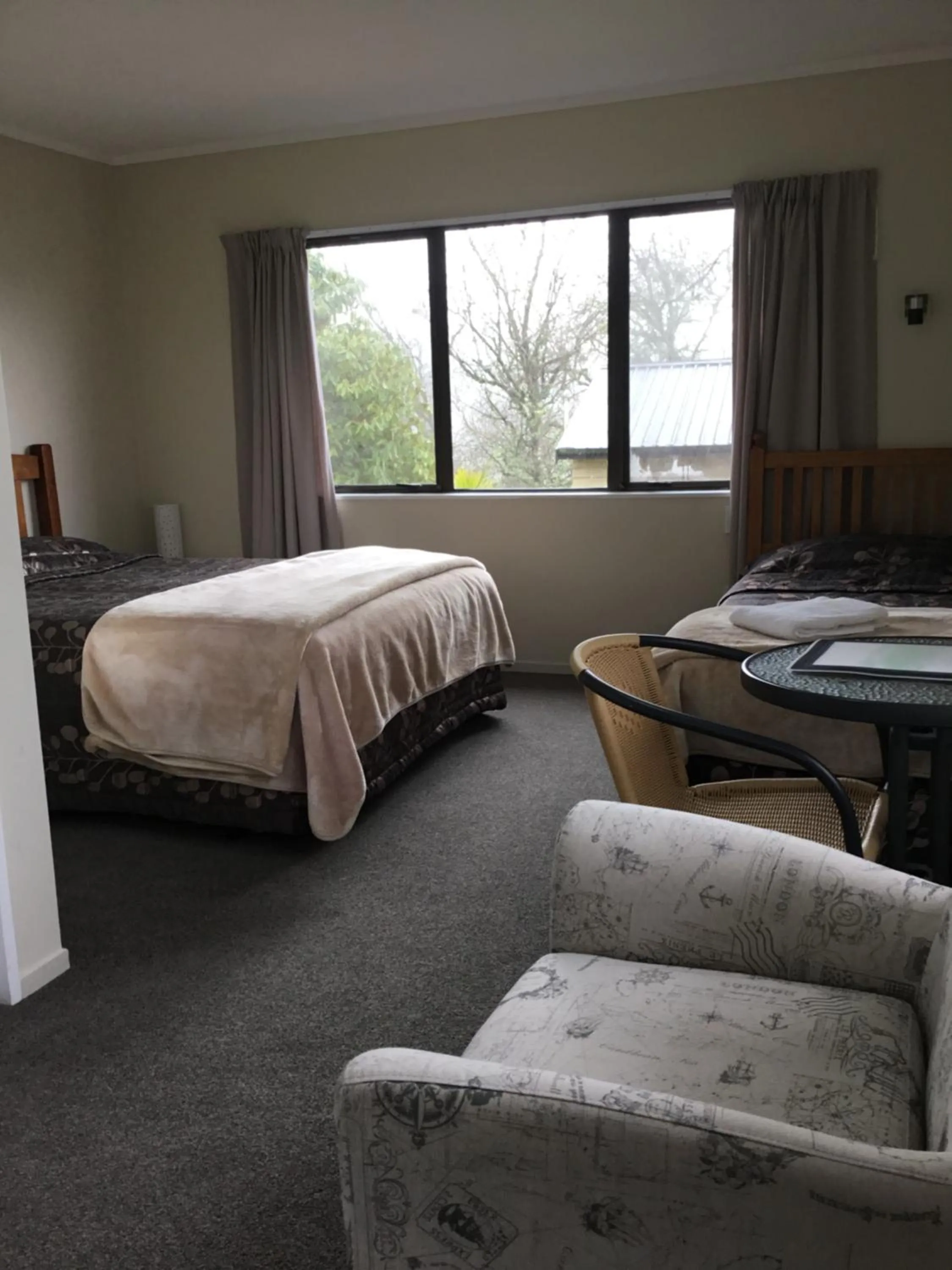 Photo of the whole room, Bed in Waitomo Caves Guest Lodge