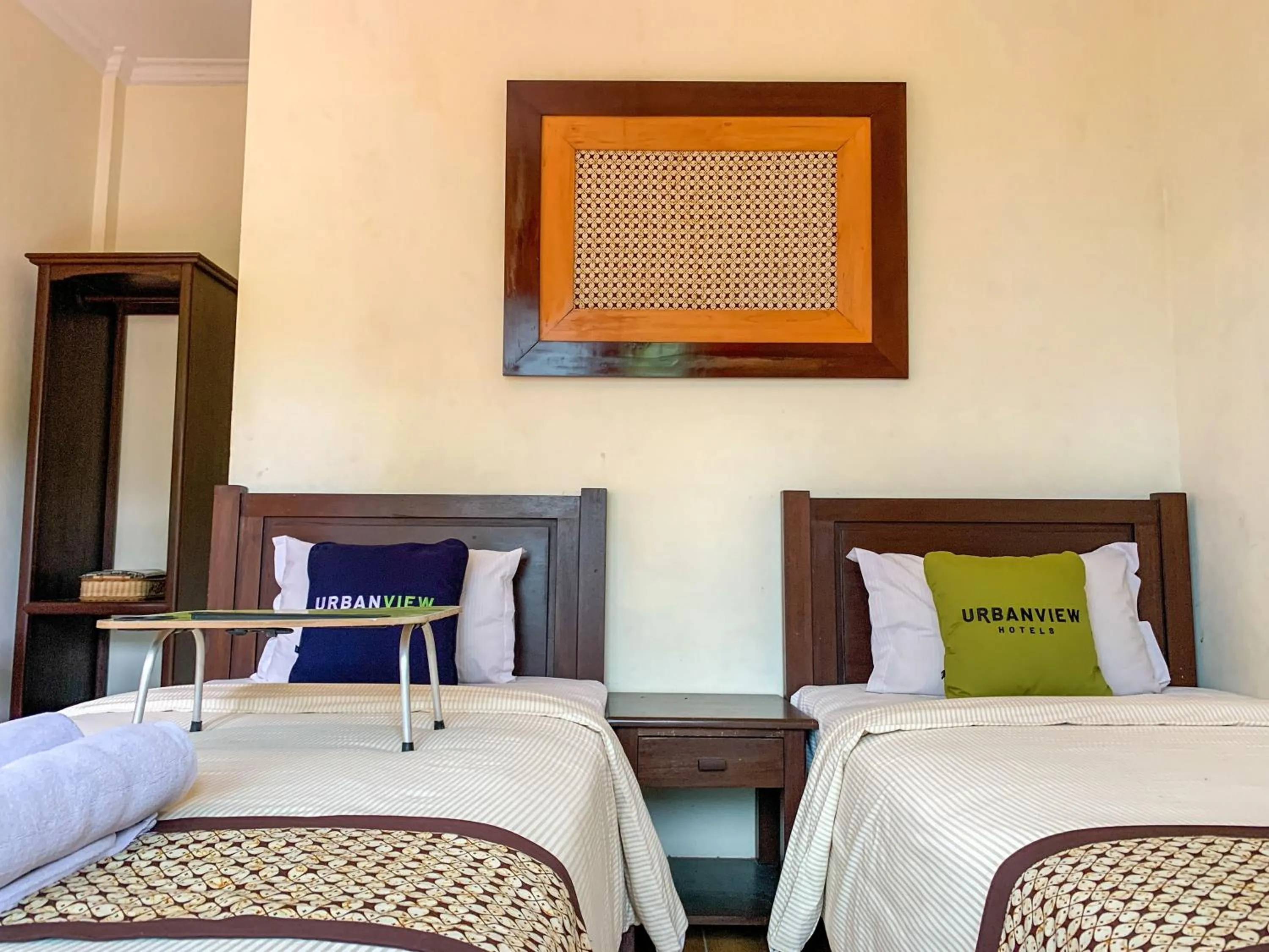 Bed in Urbanview Sasono Putro Condoongcatur by RedDoorz