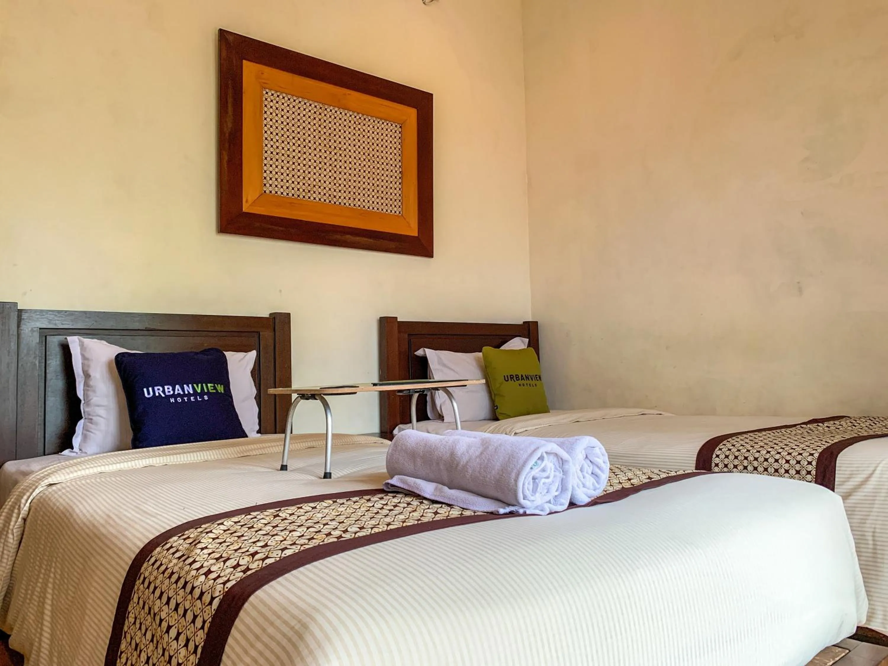 Bed in Urbanview Sasono Putro Condoongcatur by RedDoorz