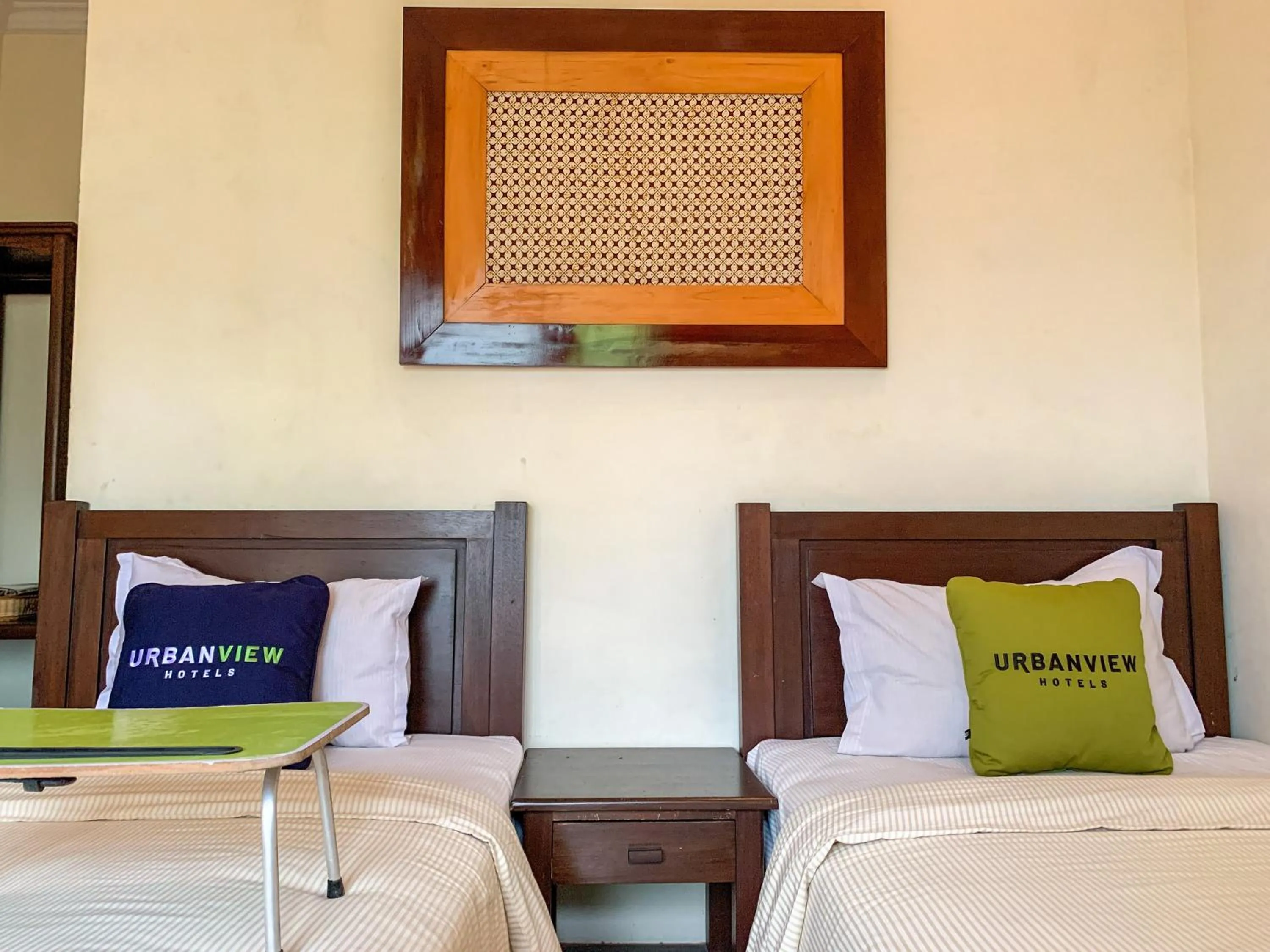 Bed in Urbanview Sasono Putro Condoongcatur by RedDoorz