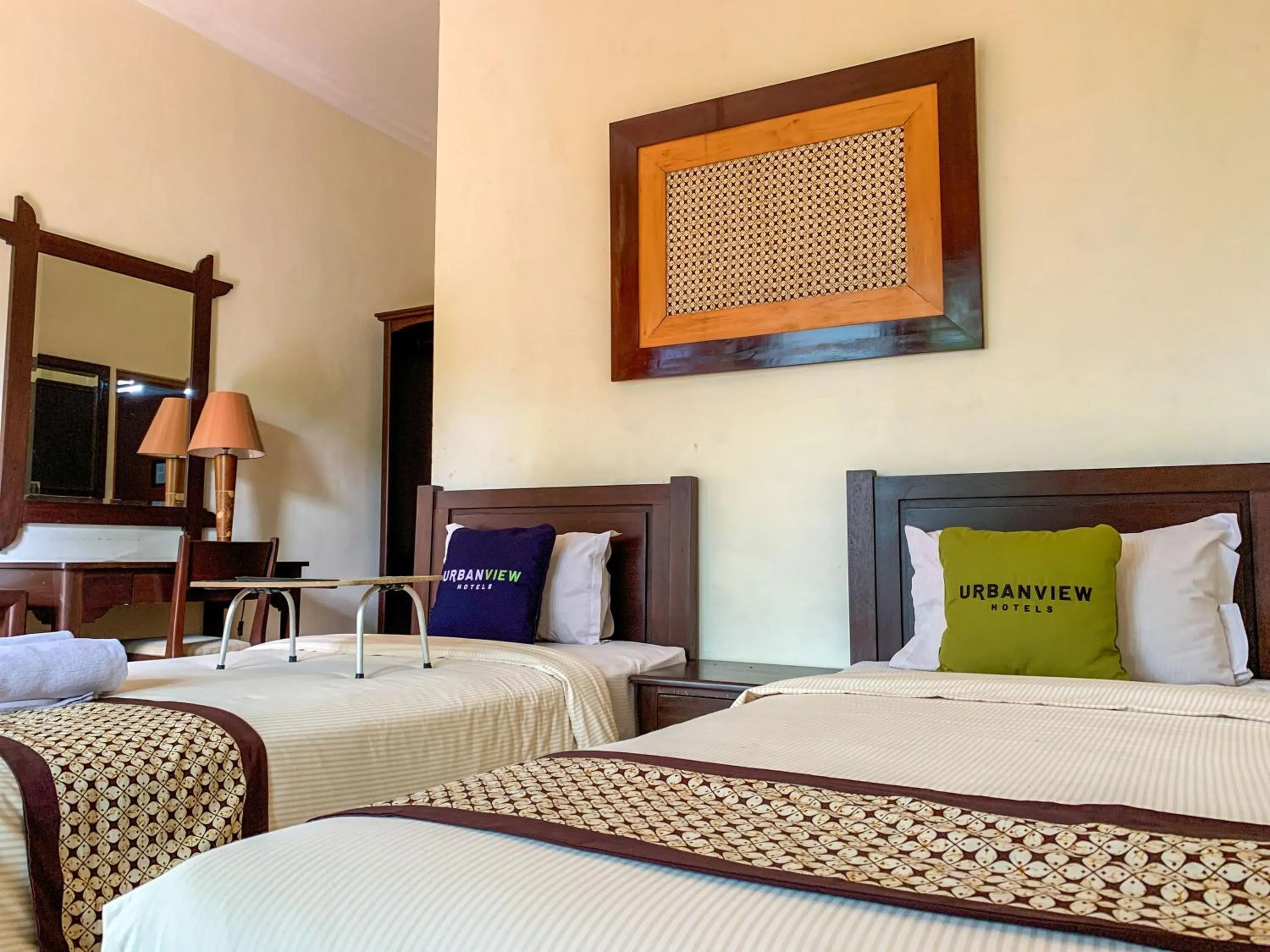 Bed in Urbanview Sasono Putro Condoongcatur by RedDoorz