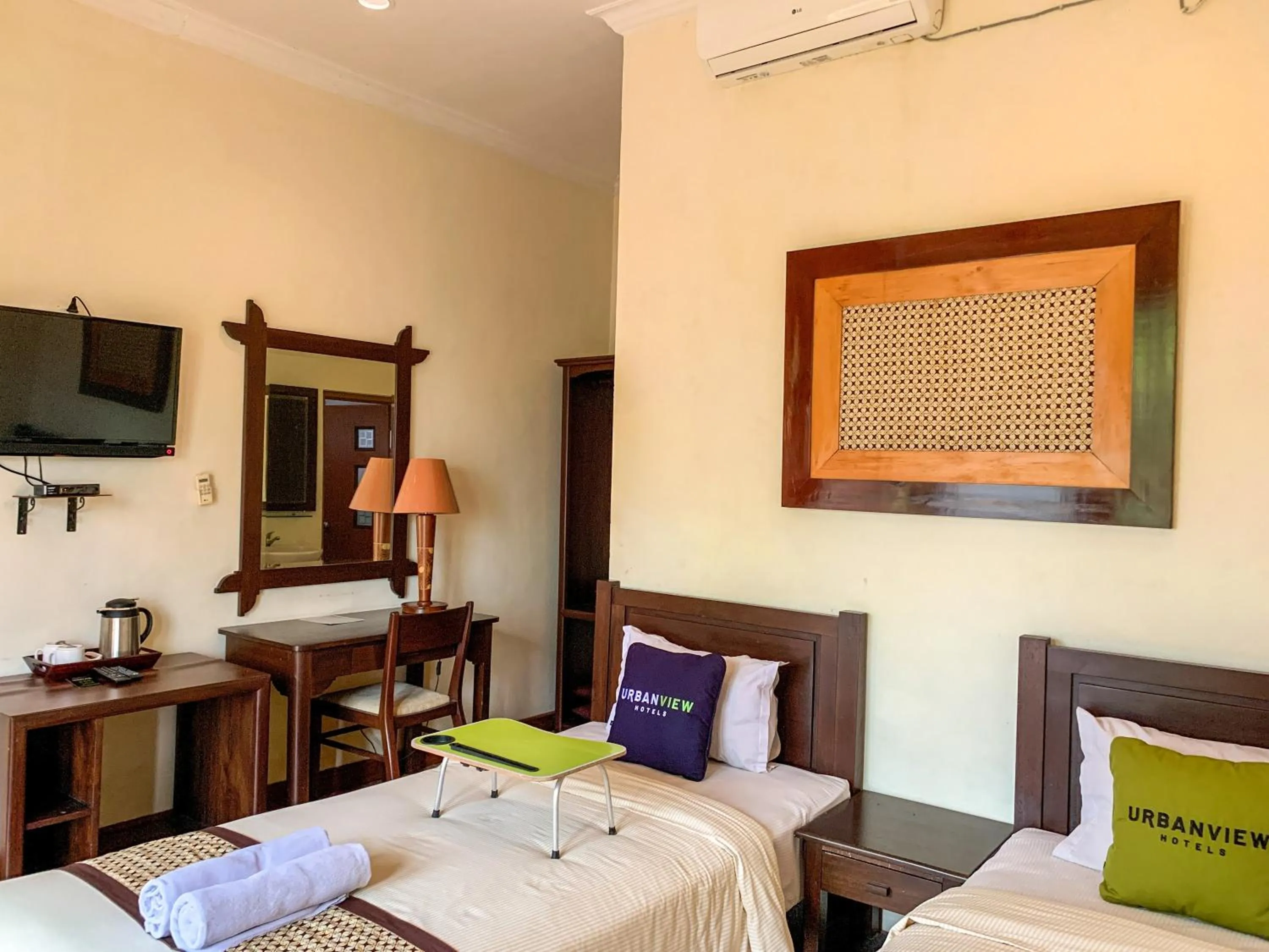 Bed in Urbanview Sasono Putro Condoongcatur by RedDoorz