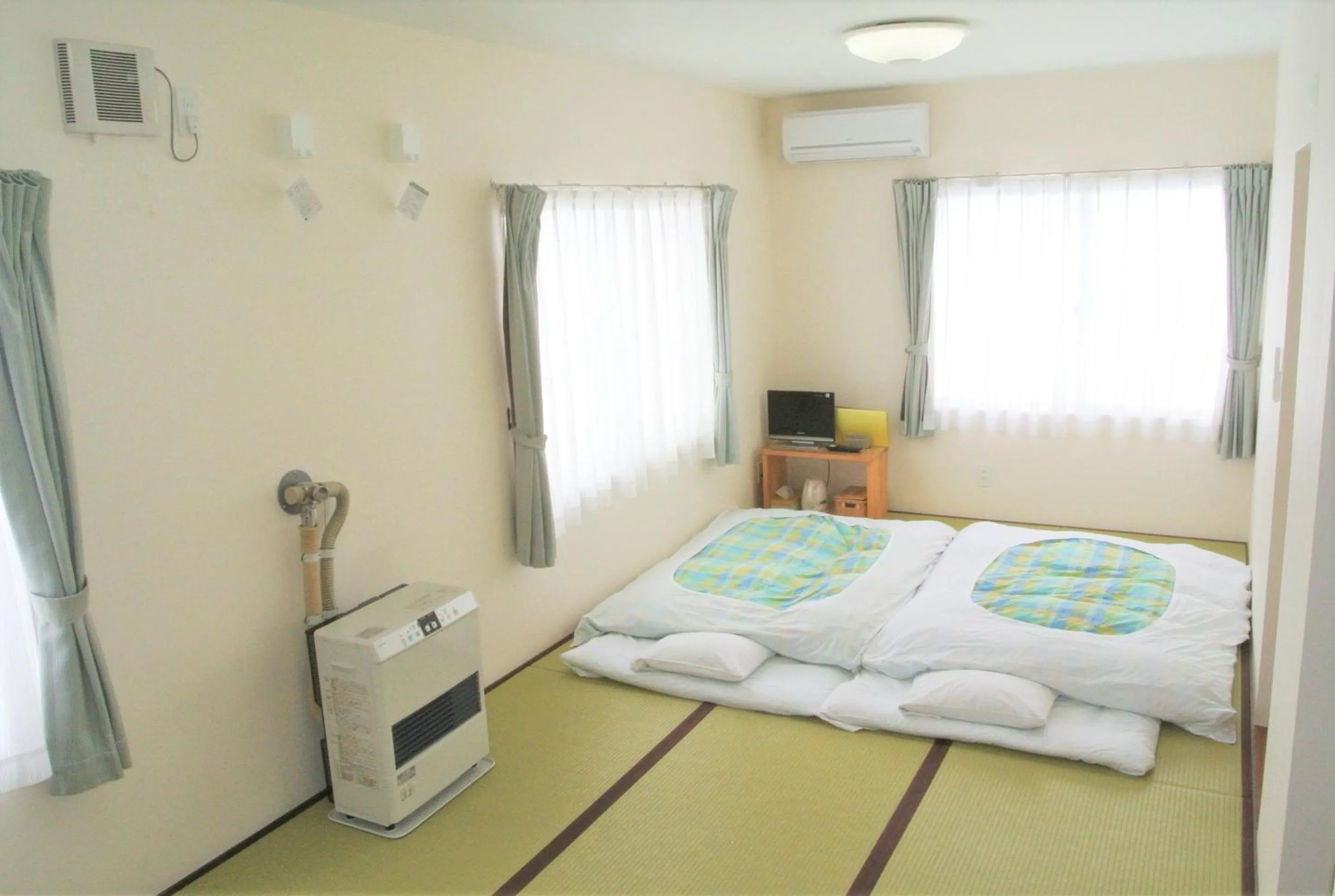 Bed in Pension Megumiyuki