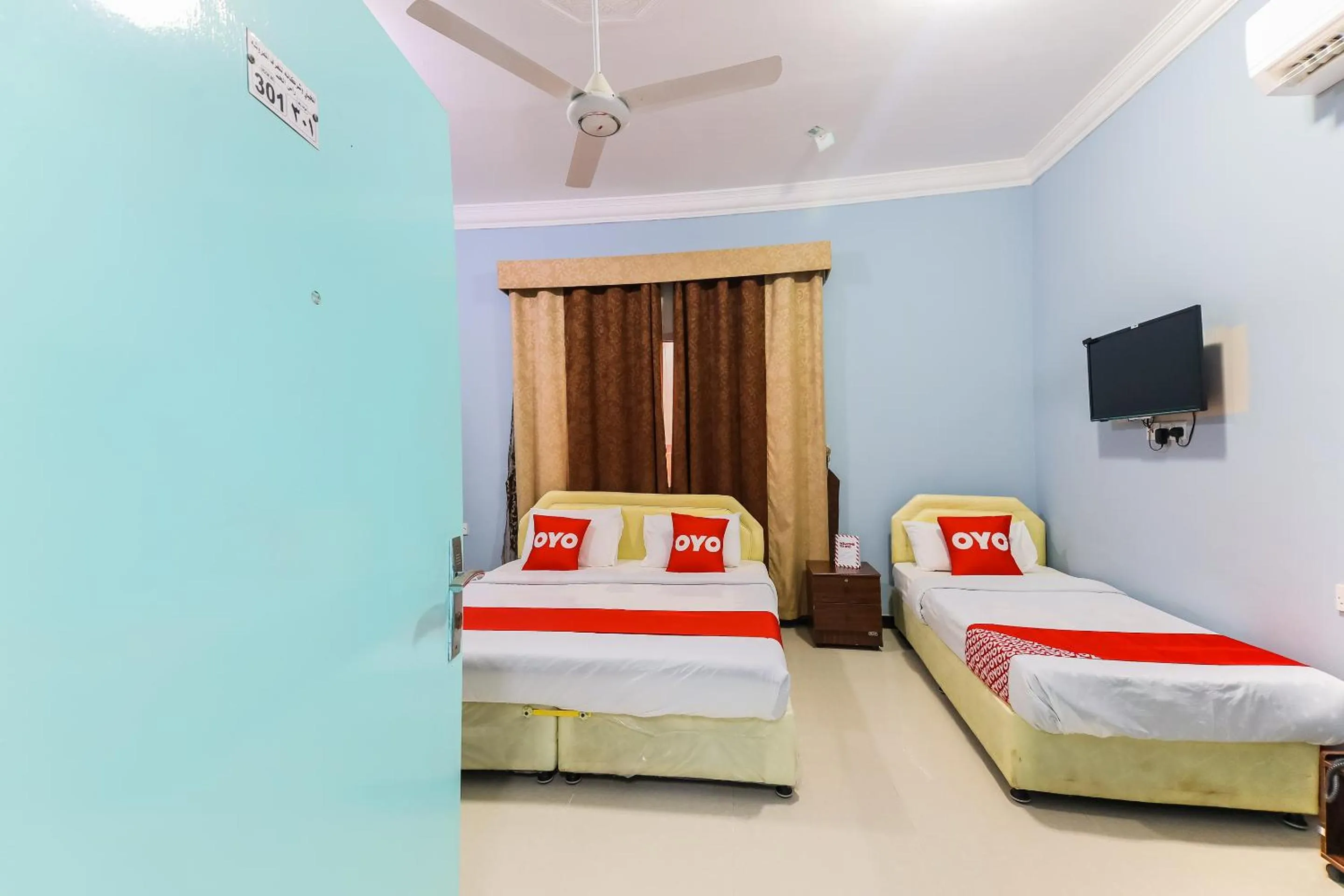 Photo of the whole room, Bed in Super OYO 110 Ras Al Hadd Guest House