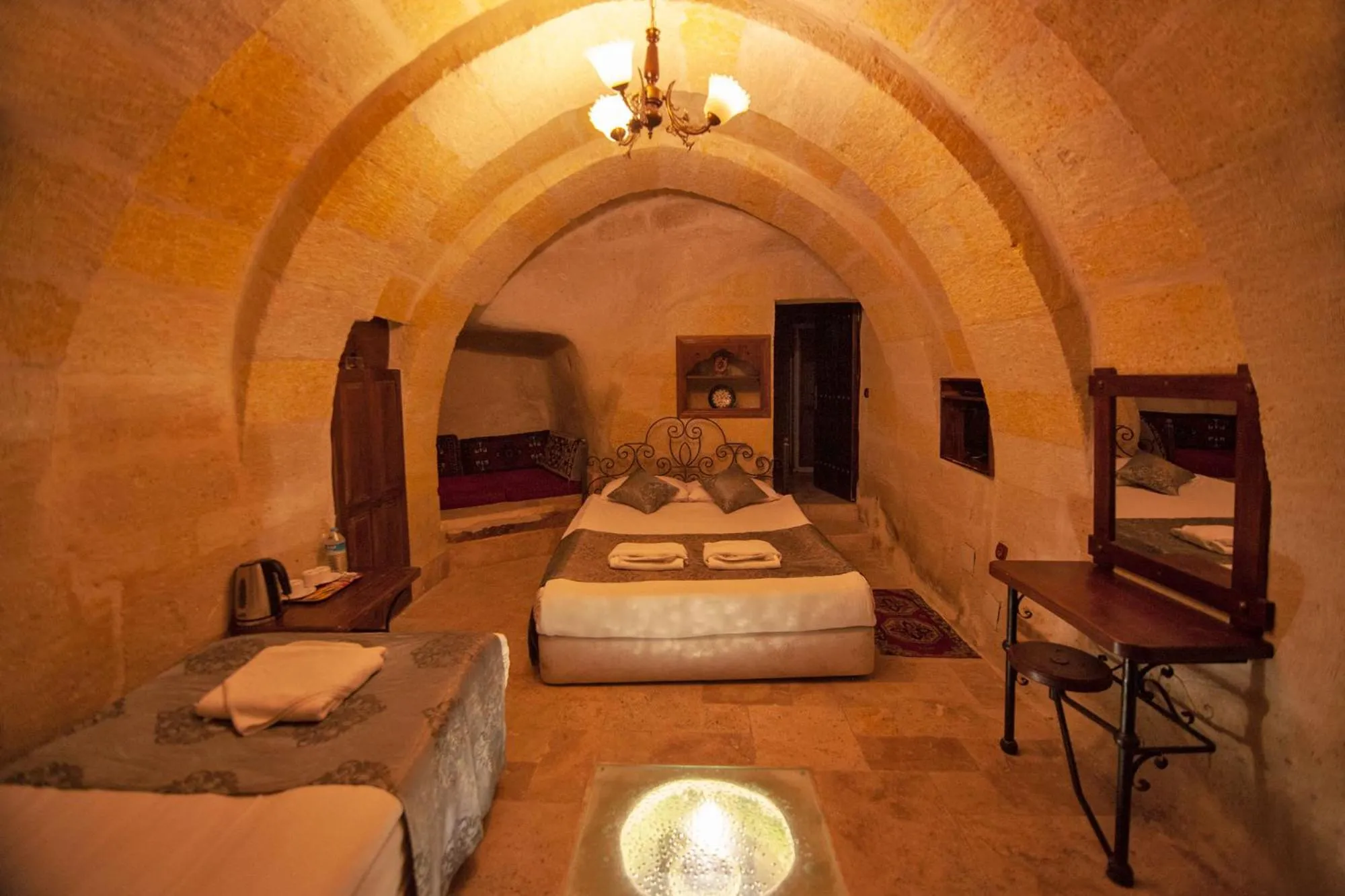 Photo of the whole room, Bed in Center Cave House