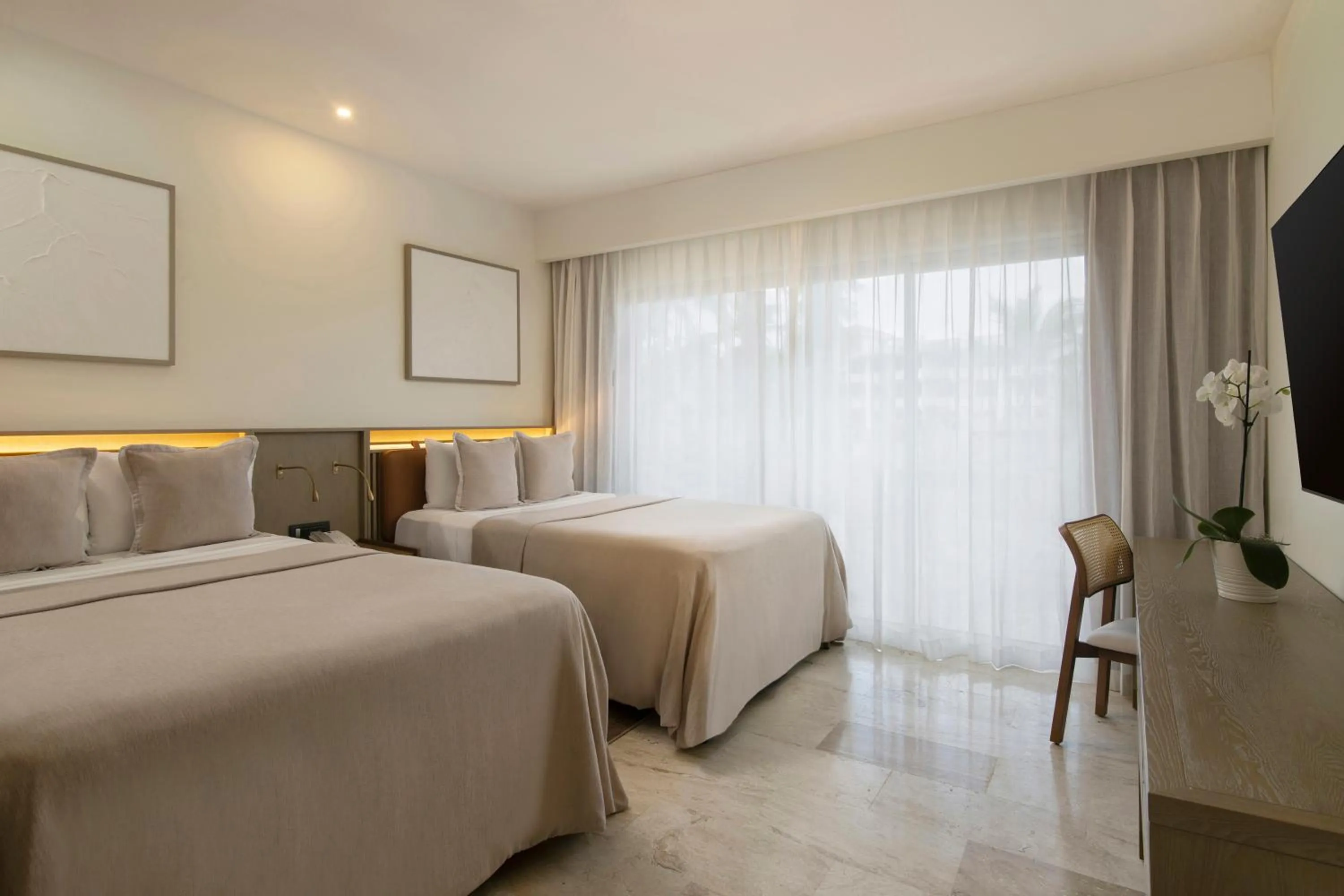 Bed in Paradisus Palma Real Golf & Spa Resort All Inclusive