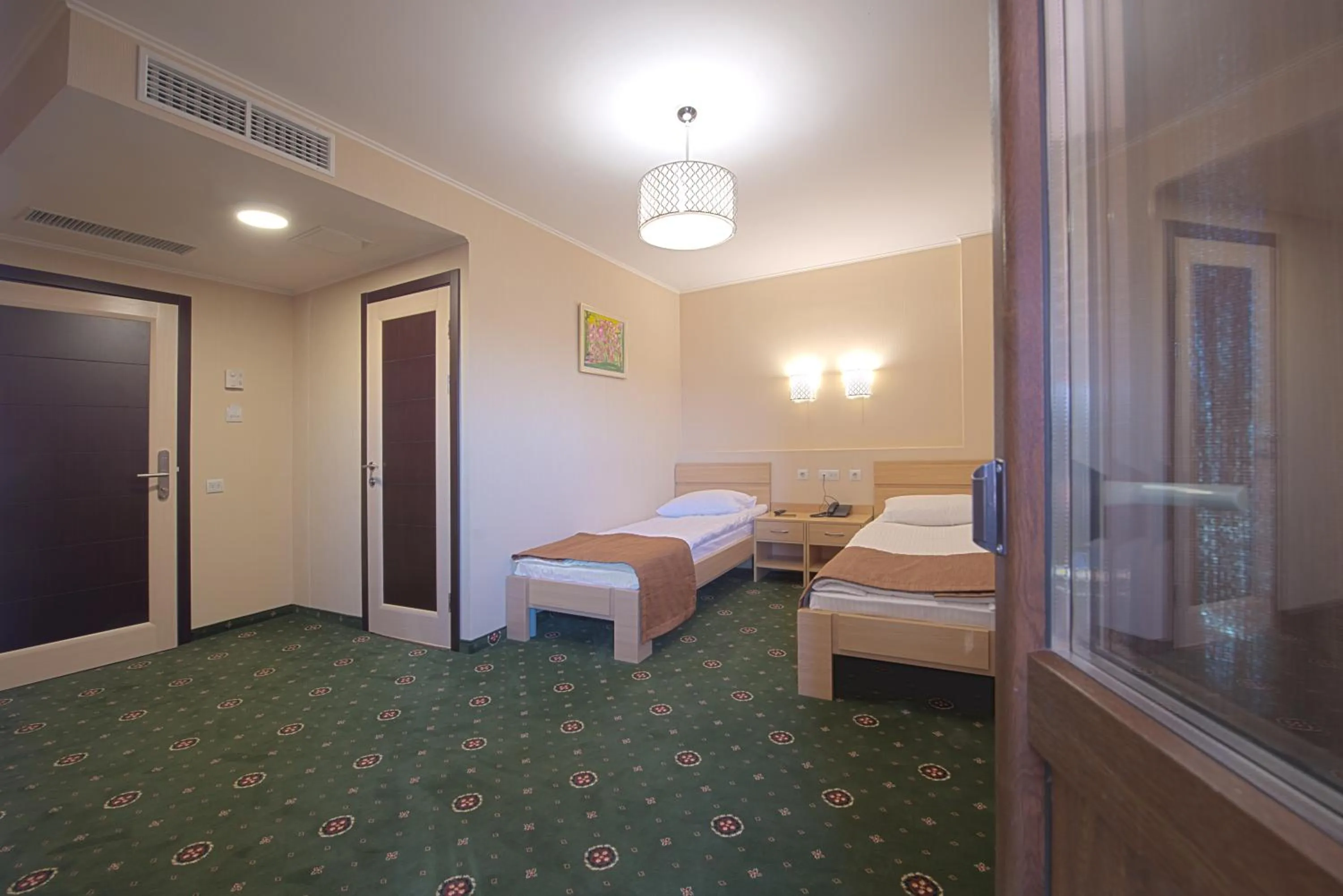 Photo of the whole room, Bed in Advenus Hotel