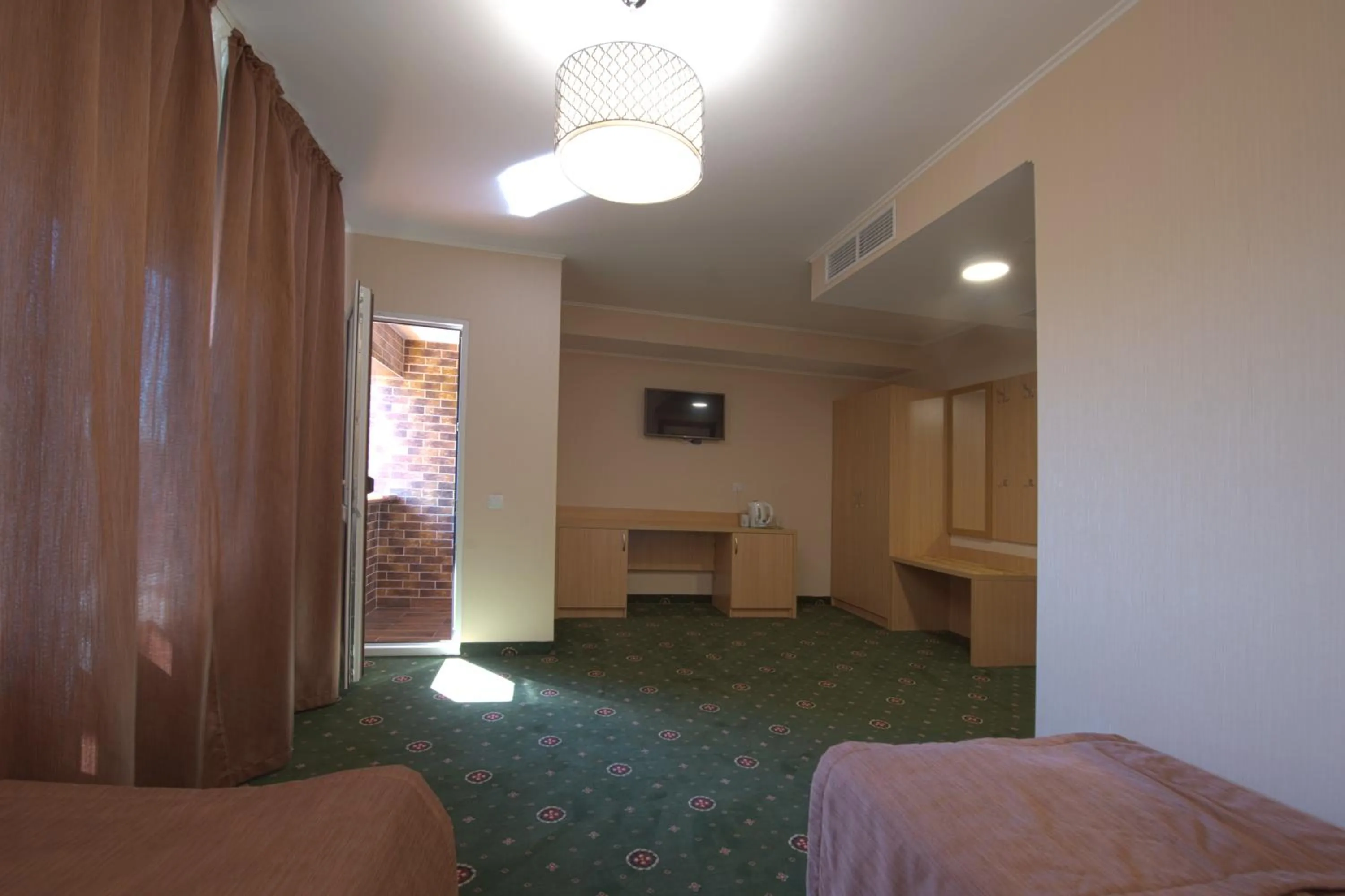 Photo of the whole room, Bed in Advenus Hotel