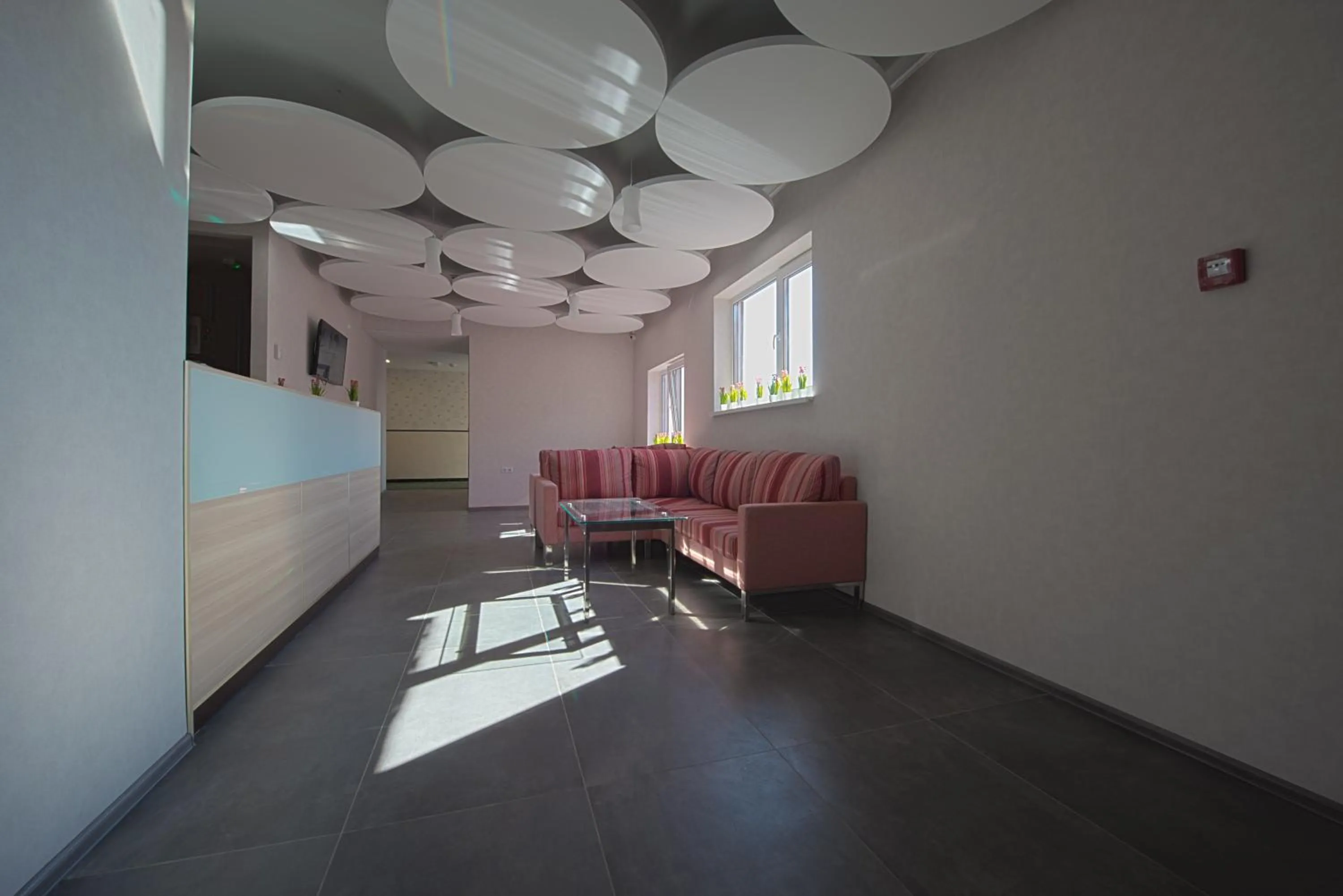 Communal lounge/ TV room in Advenus Hotel