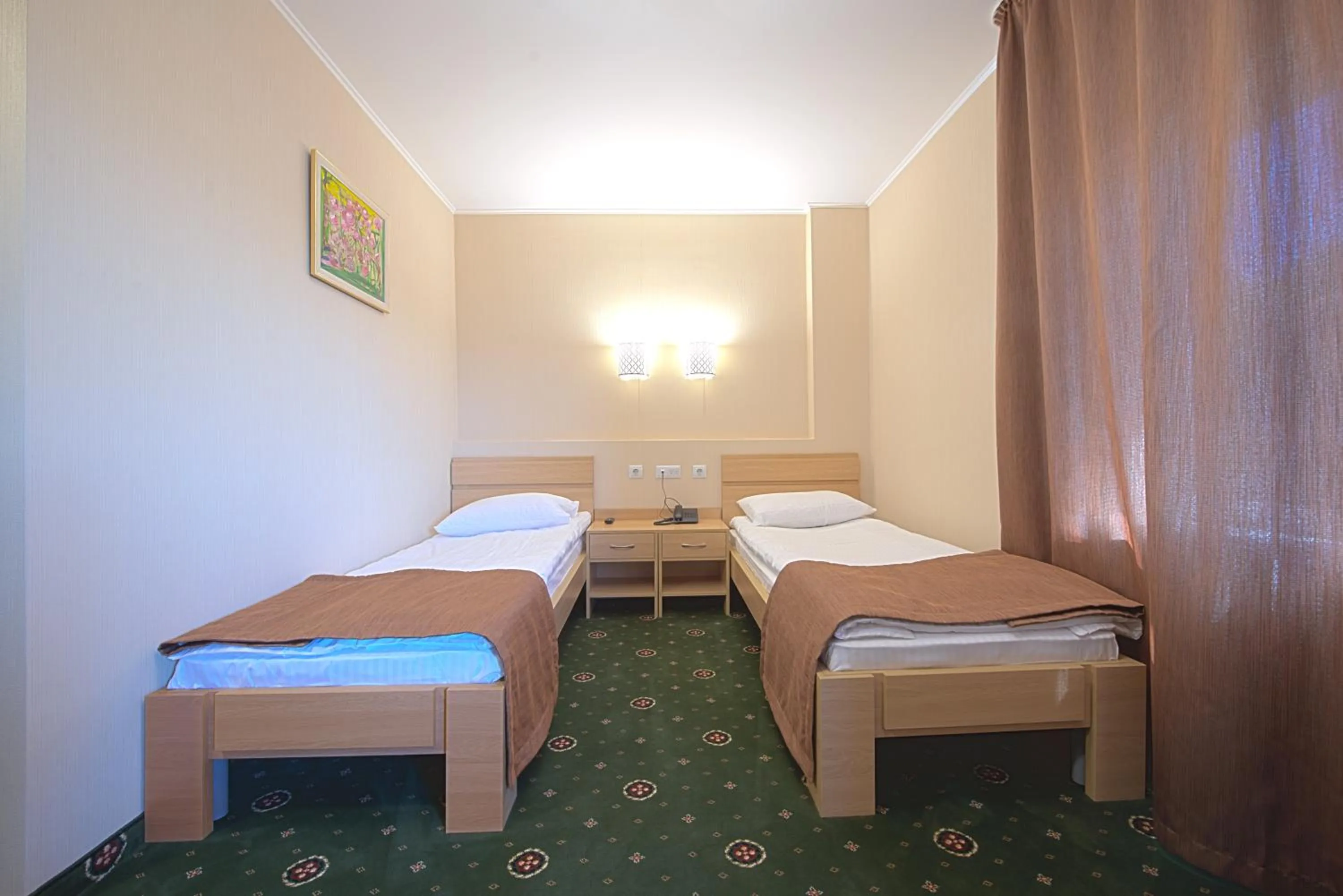 Bed in Advenus Hotel