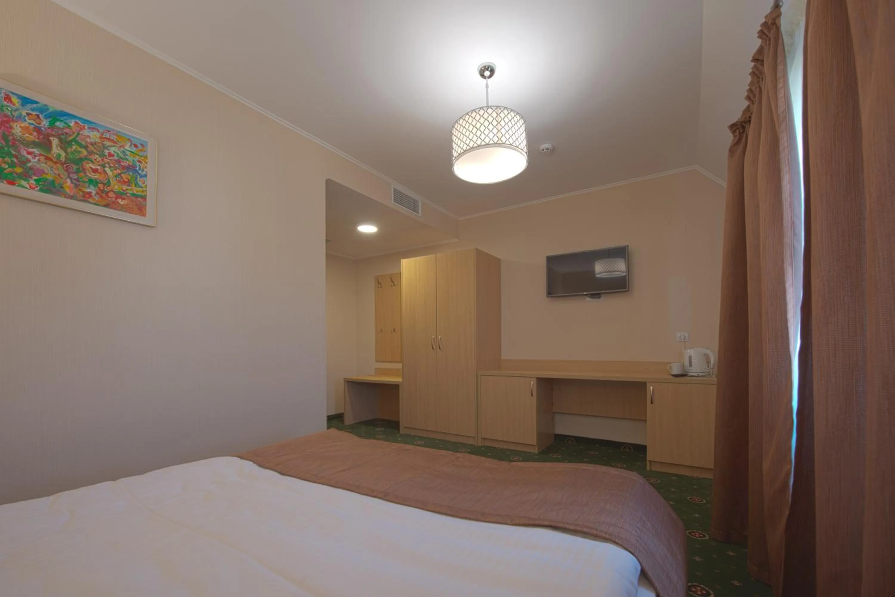 Photo of the whole room, Bed in Advenus Hotel