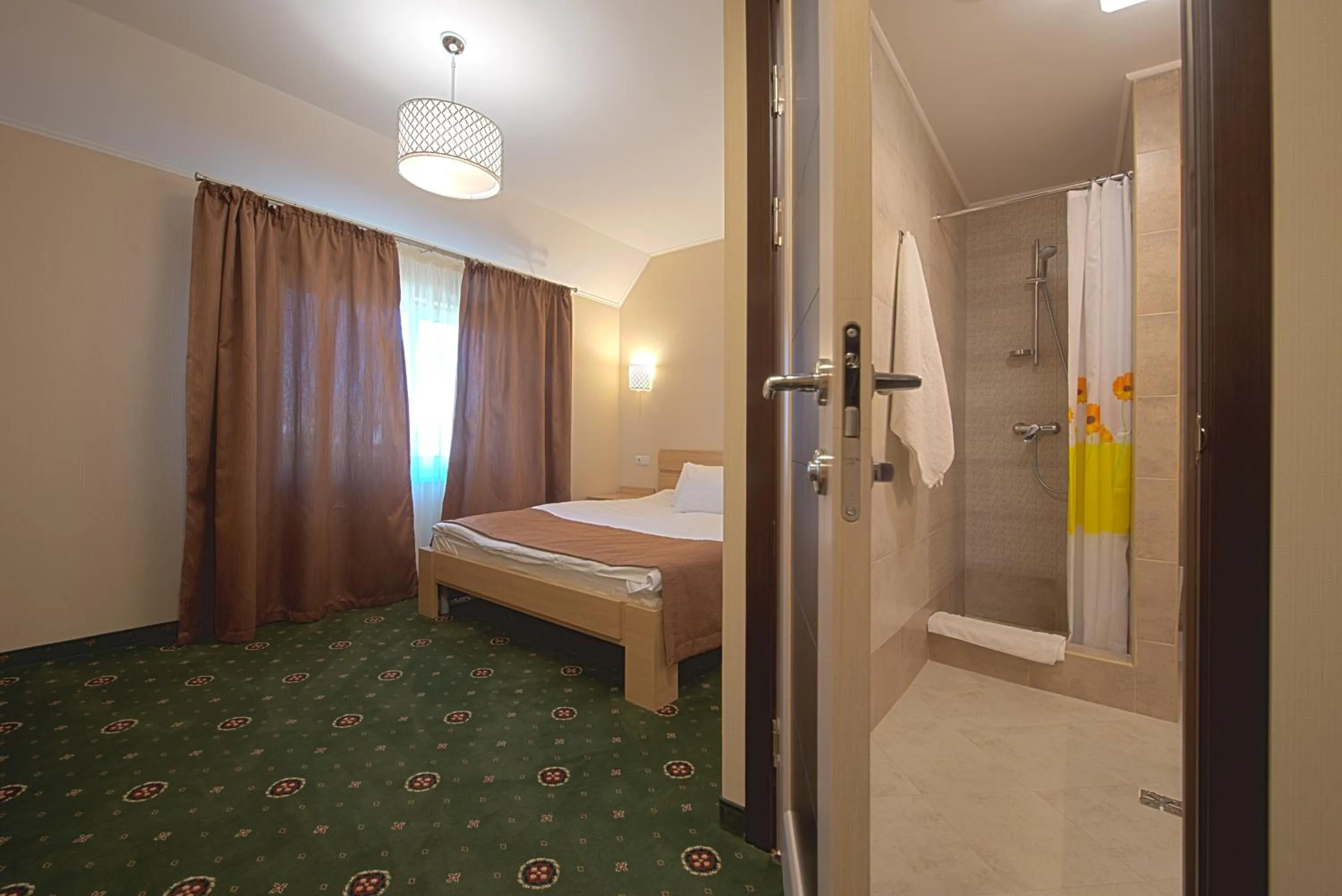 Photo of the whole room, Bed in Advenus Hotel