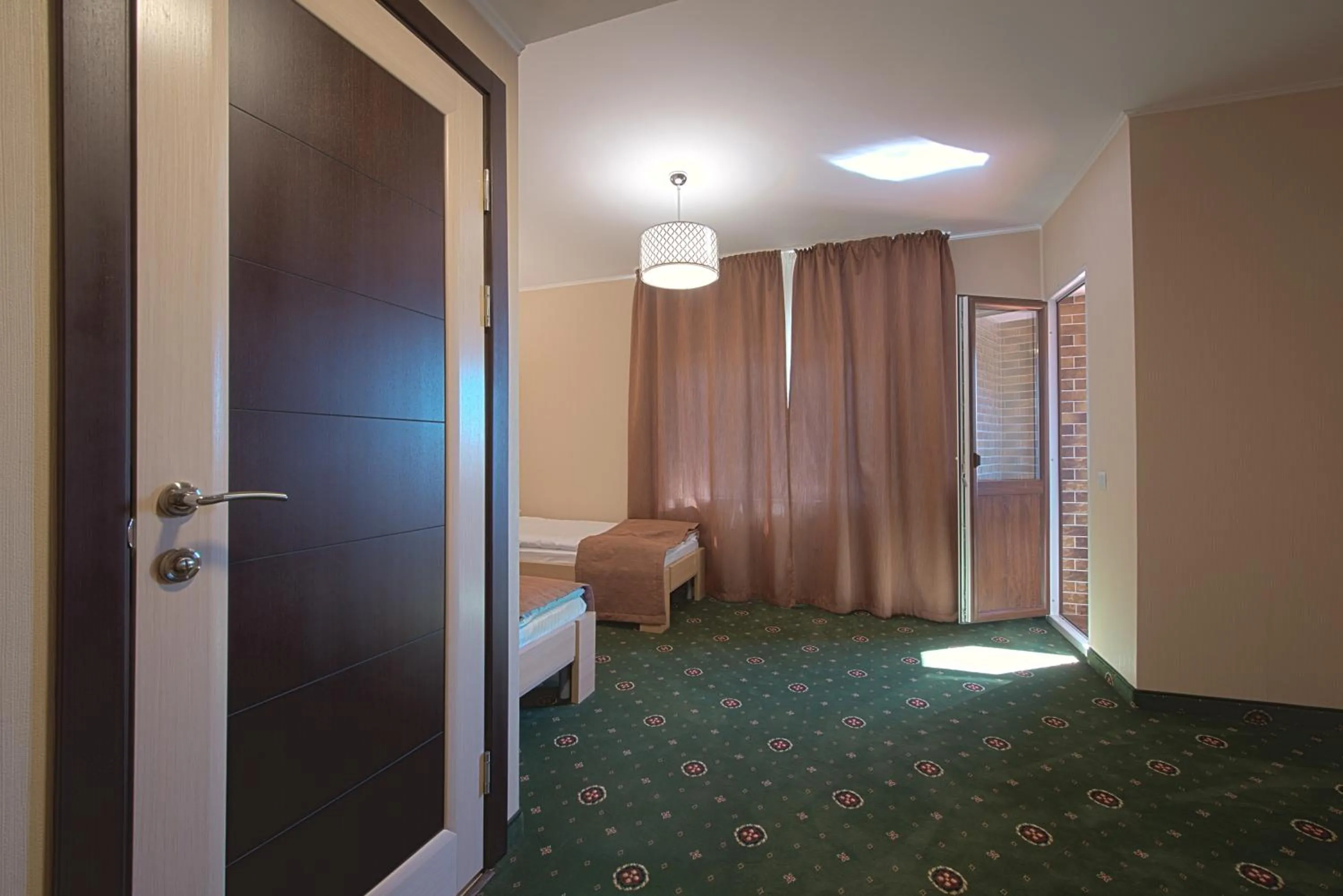 Photo of the whole room, Bed in Advenus Hotel