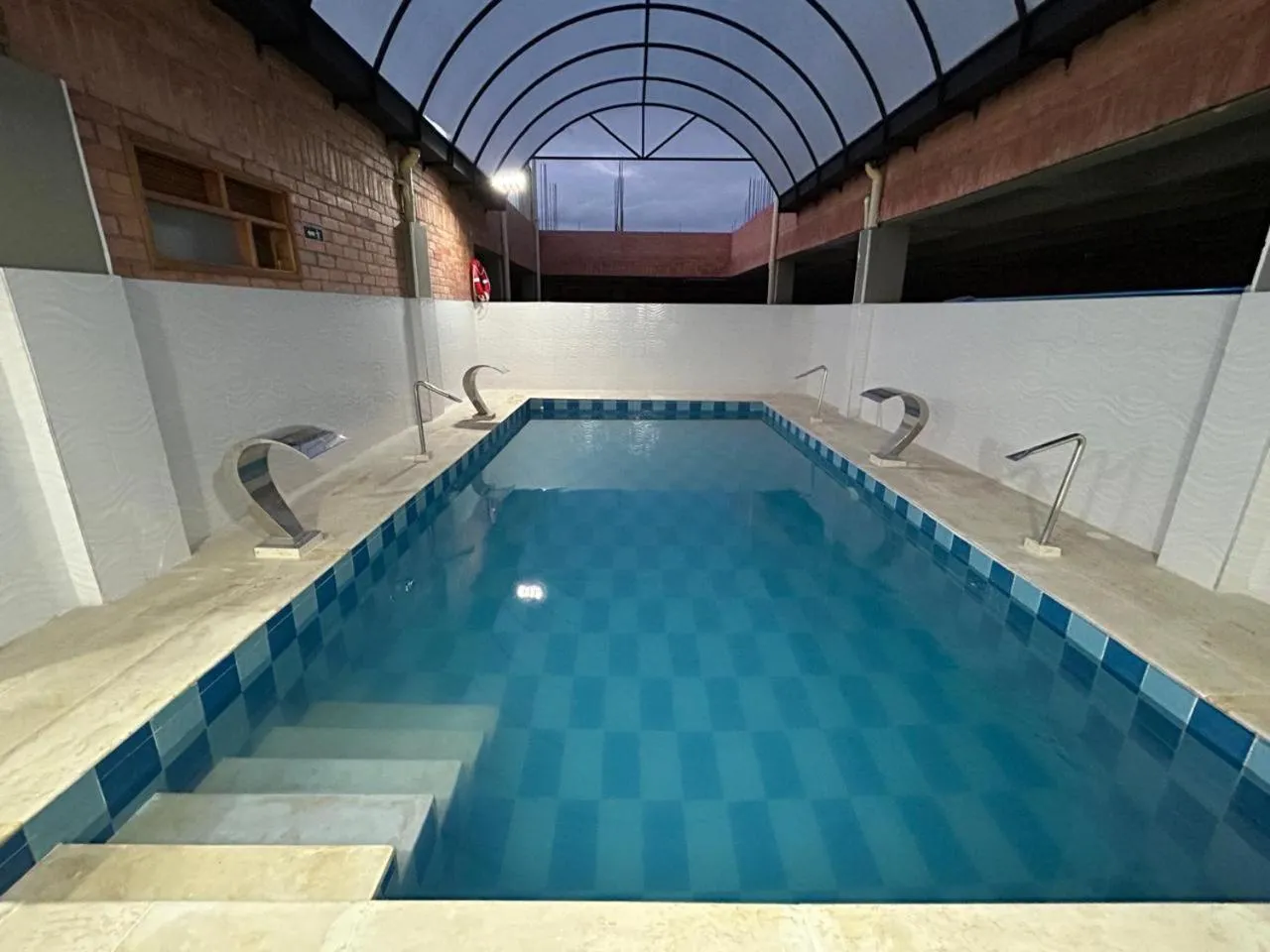 Swimming pool in HOTEL SPA Villasaurio