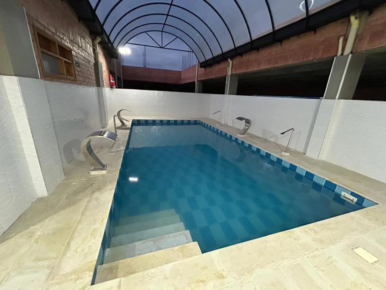 Swimming pool in HOTEL SPA Villasaurio